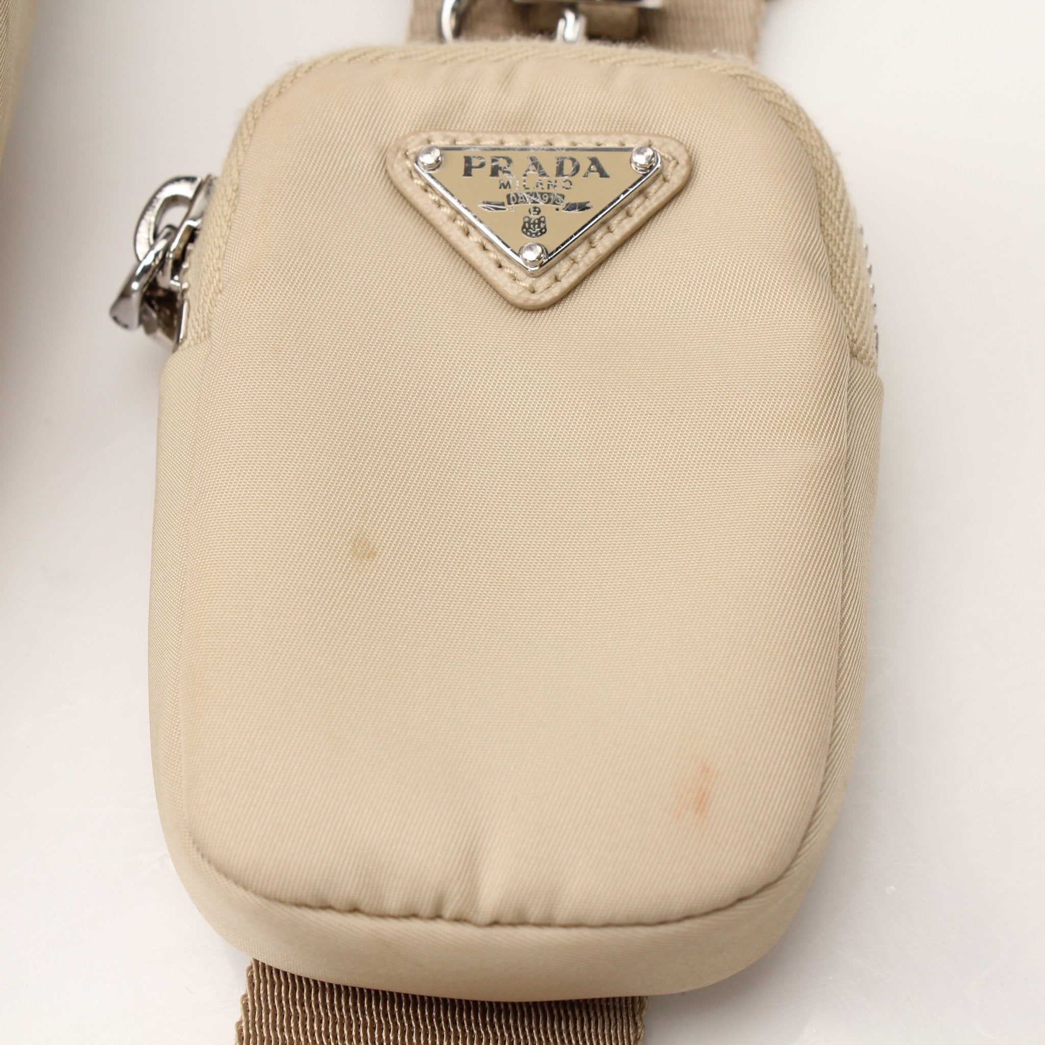 Gold & Beyond Prada Re-Edition 2005 Re-Nylon shoulder handbag with sleek design and adjustable strap, shown on a plain background.