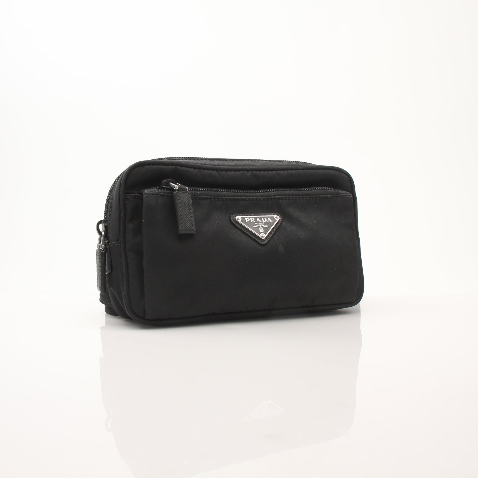 Prada Re-Nylon belt bag handbag with adjustable strap and gold-tone hardware, black fabric with logo accents.