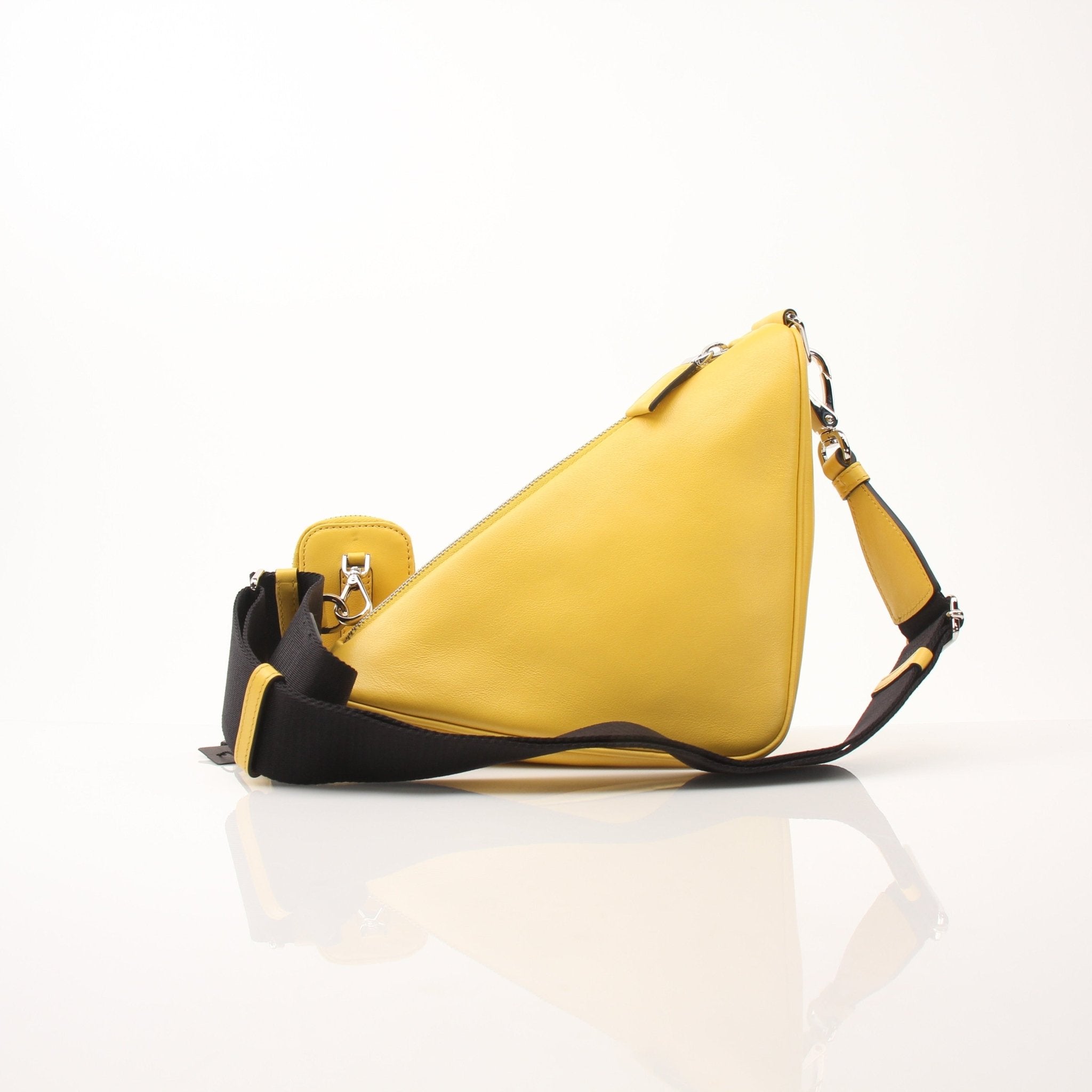 Luxury Prada Grace Lux Triangle leather shoulder handbag with gold hardware, featuring a sleek design and adjustable strap.