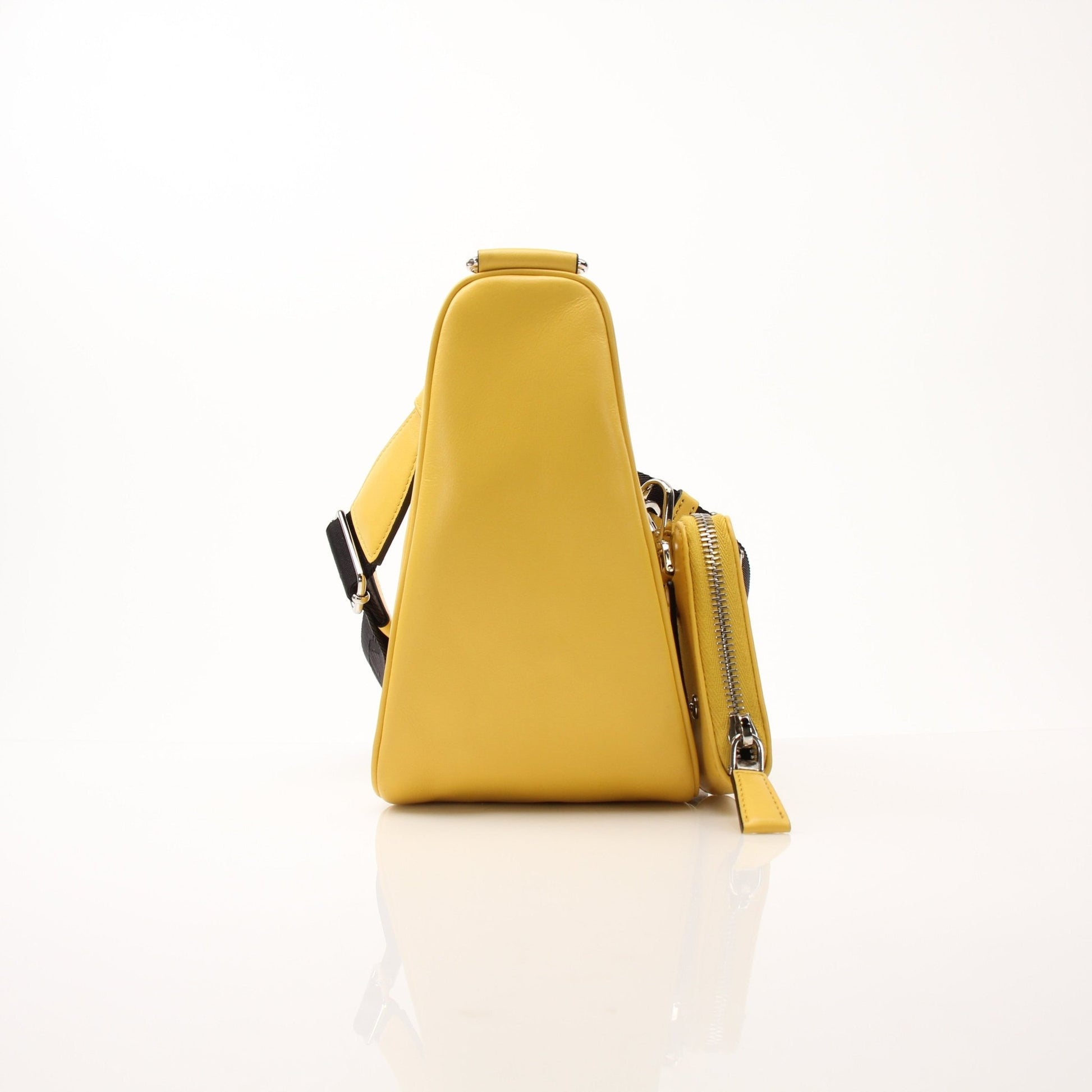 Prada Grace Lux Triangle Leather Shoulder Bag showcasing elegant leather design and structured shape