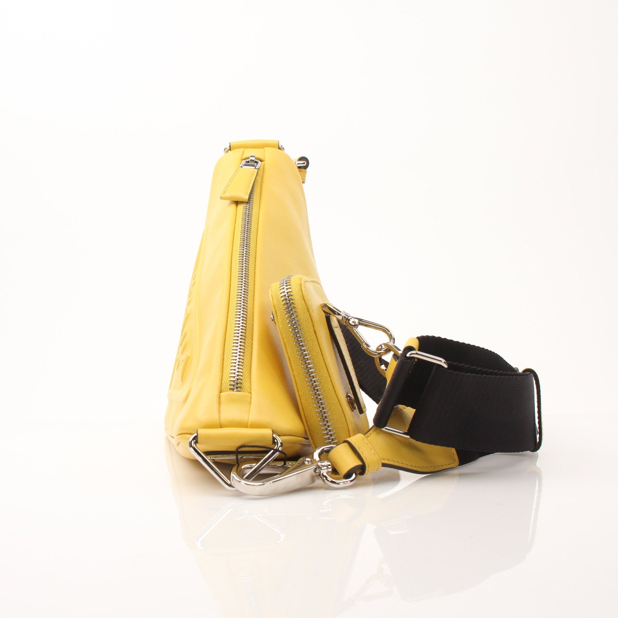Gold & Beyond Prada Grace Lux Triangle leather shoulder handbag with gold hardware and sleek design.