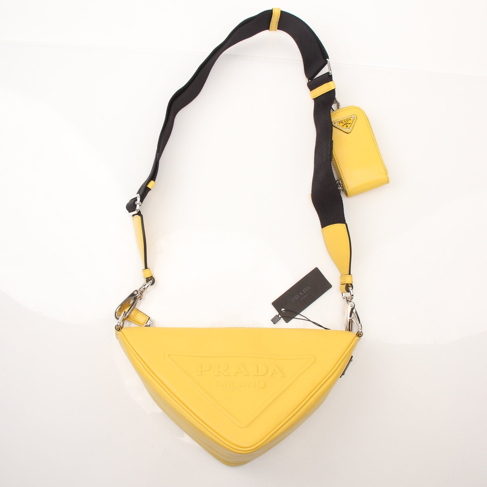Prada Grace Lux Triangle Leather Shoulder Bag, elegant handbag with gold accents and structured design, crafted from smooth leather.