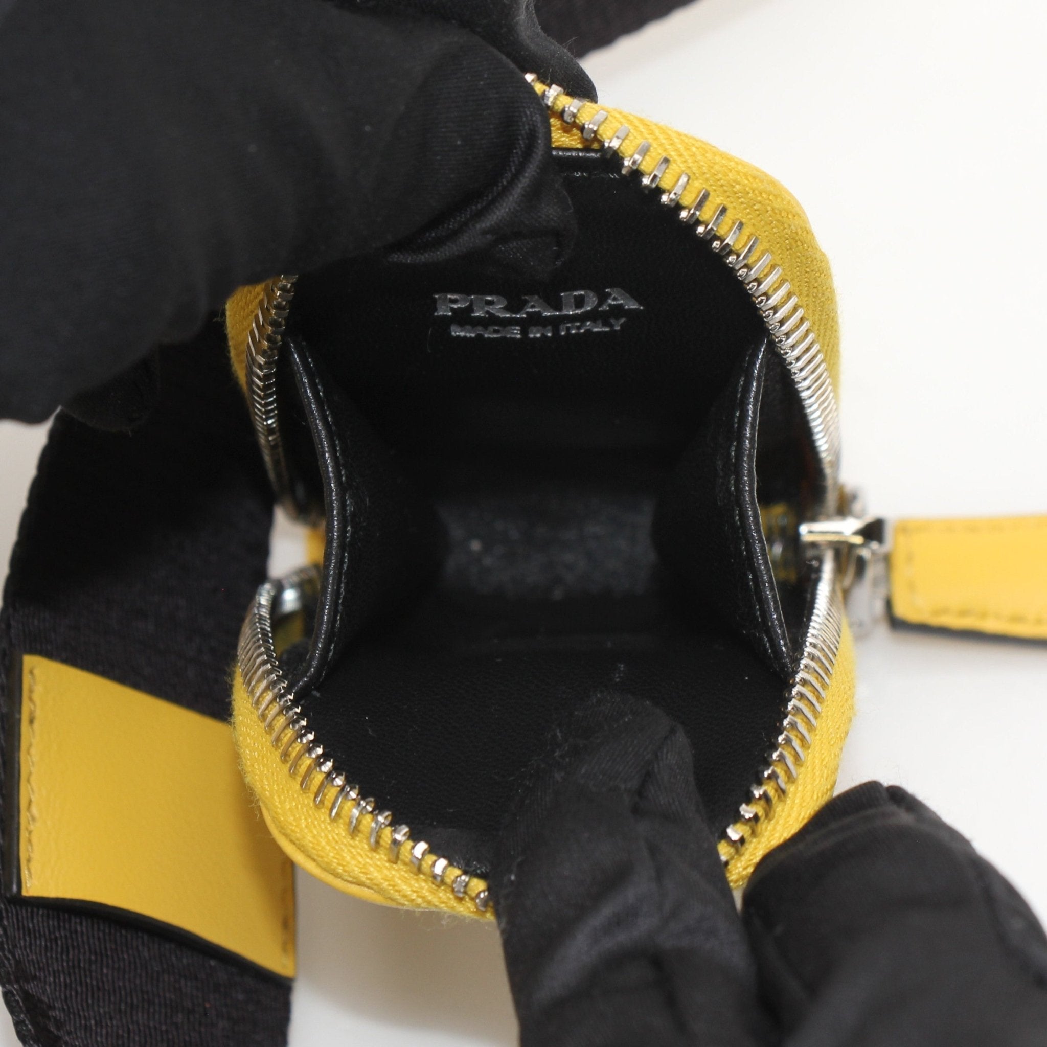 Gold & Beyond Prada Grace Lux Triangle leather shoulder handbag with elegant design and stylish shoulder strap.