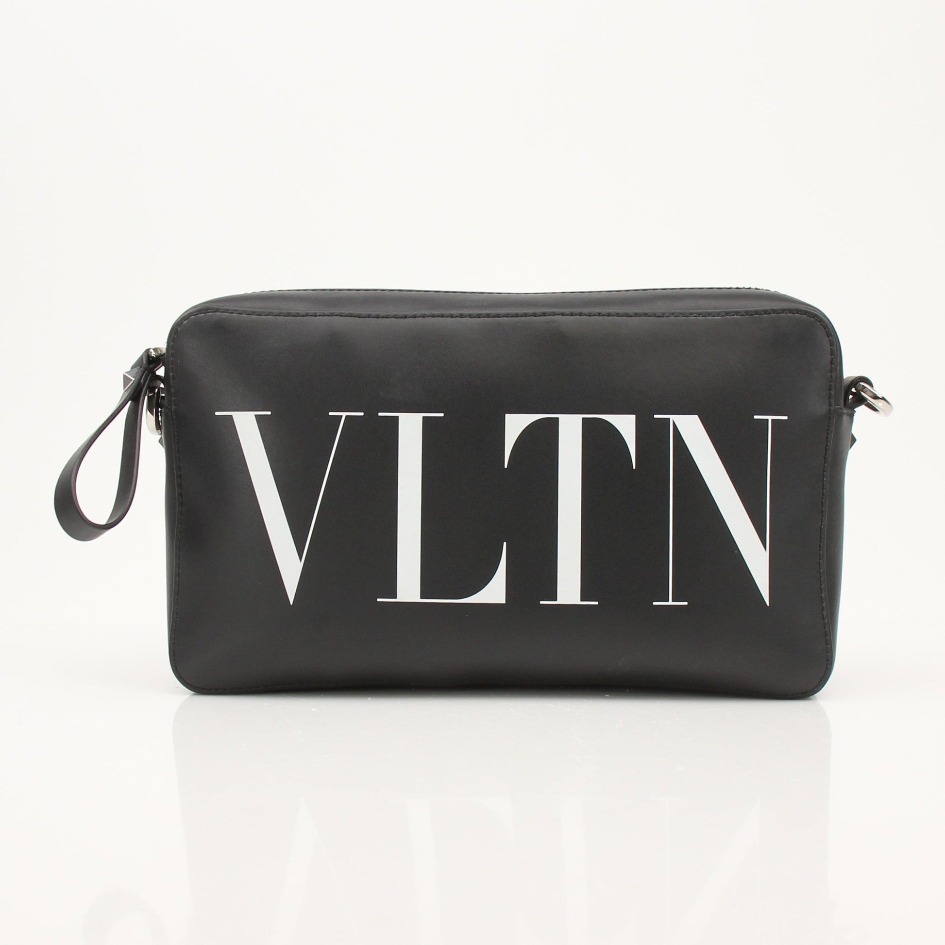 Gold & Beyond Valentino black crossbody handbag with sleek design and adjustable strap, featuring elegant craftsmanship.