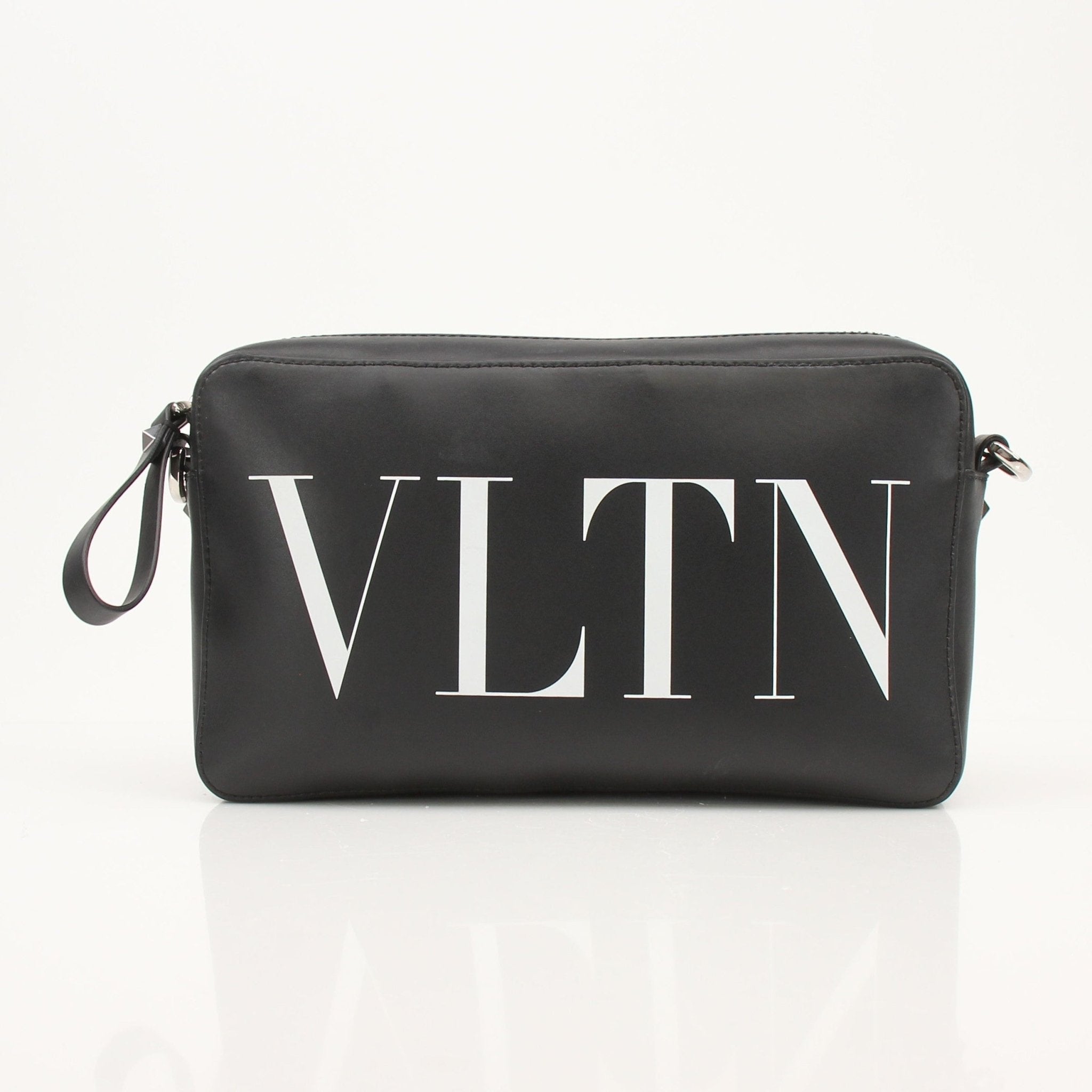 Gold & Beyond Valentino black crossbody handbag with sleek design and adjustable strap, featuring elegant craftsmanship.