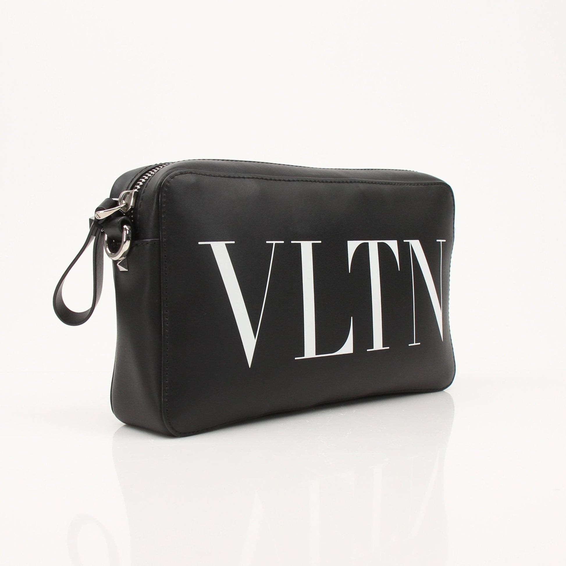 Gold & Beyond Valentino black crossbody handbag with sleek design and adjustable strap, stylish accessory for everyday wear.