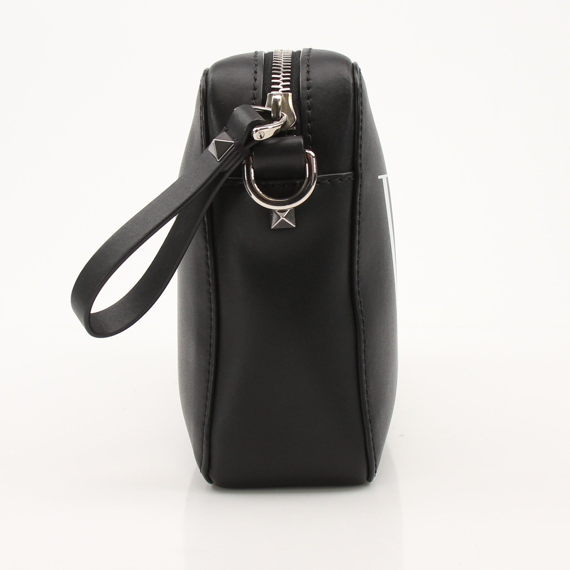 Gold & Beyond Valentino black crossbody handbag with sleek design and adjustable strap, perfect for stylish everyday wear.