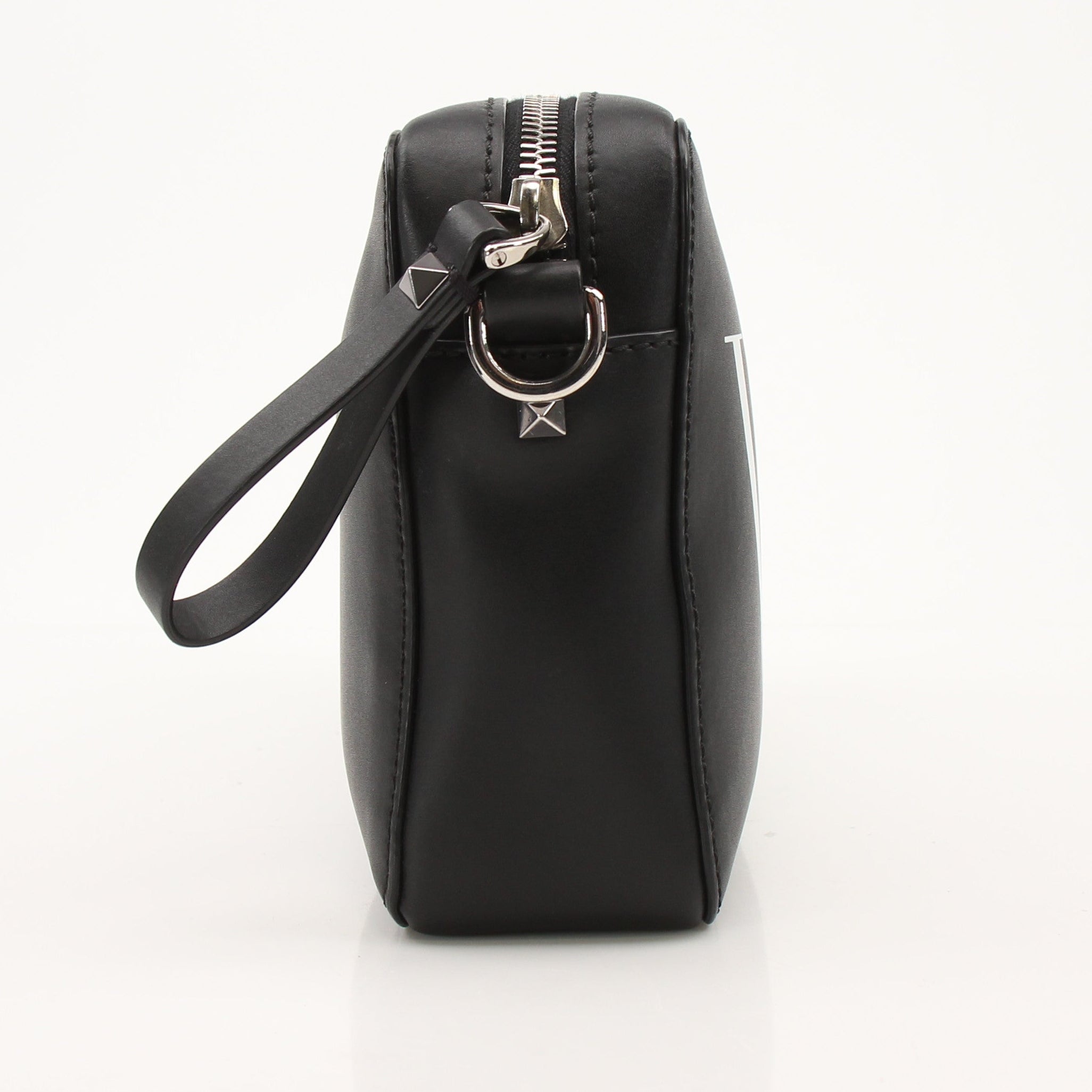 Gold & Beyond Valentino black crossbody handbag with sleek design and adjustable strap, perfect for stylish everyday wear.
