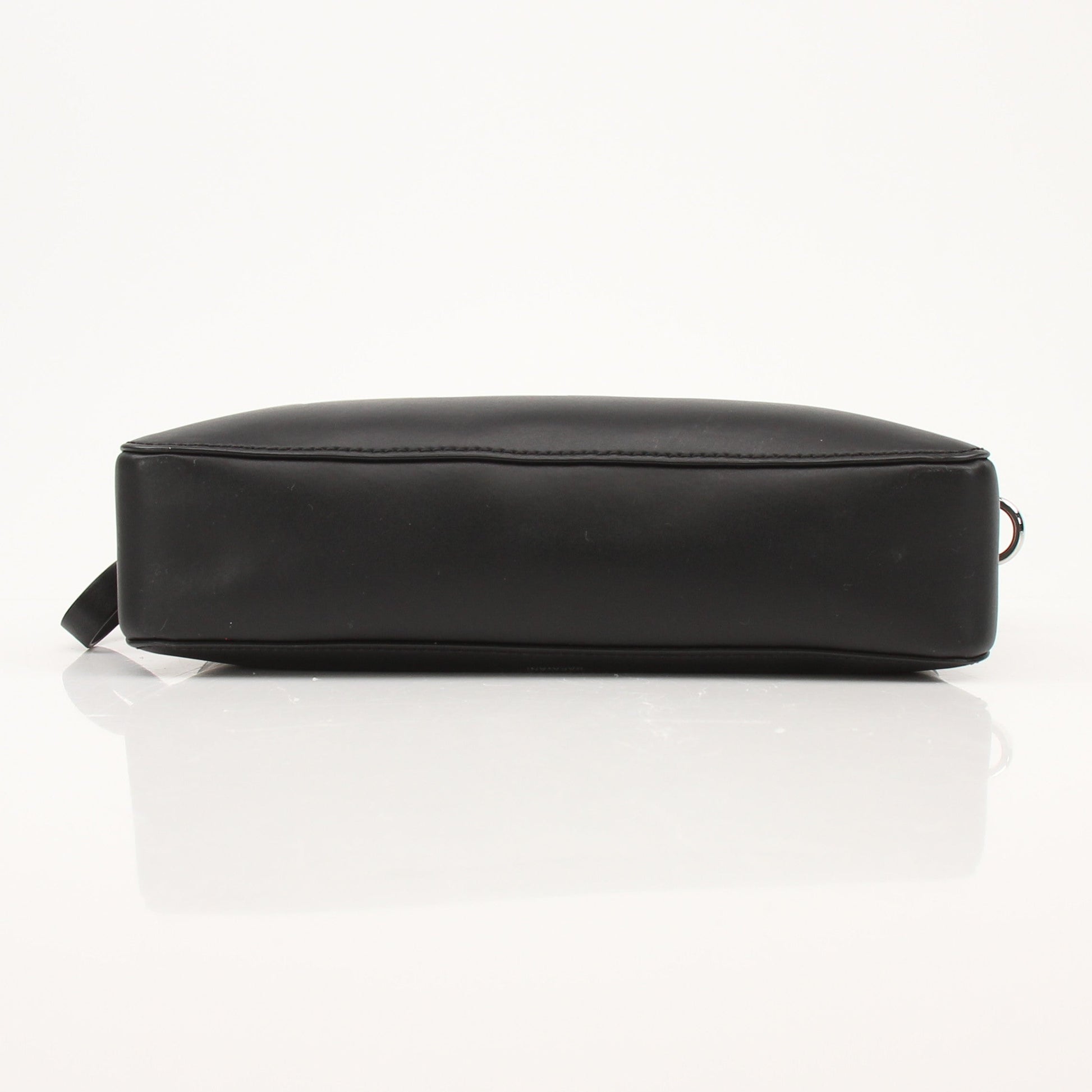 Black Valentino crossbody handbag by Gold & Beyond with sleek design and adjustable strap, featuring a minimalist style.