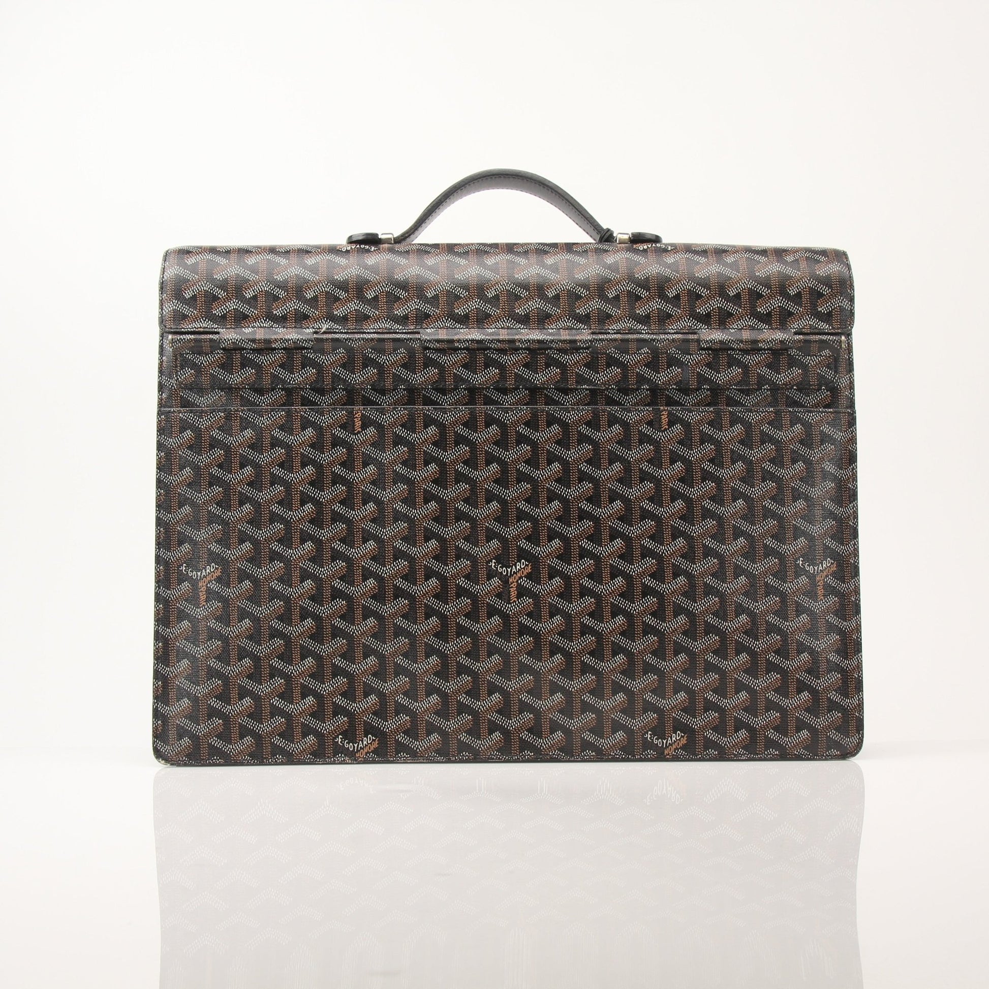 Goyard Serviette Chypre briefcase handbag with beige and green monogram pattern, gold hardware, and leather accents.