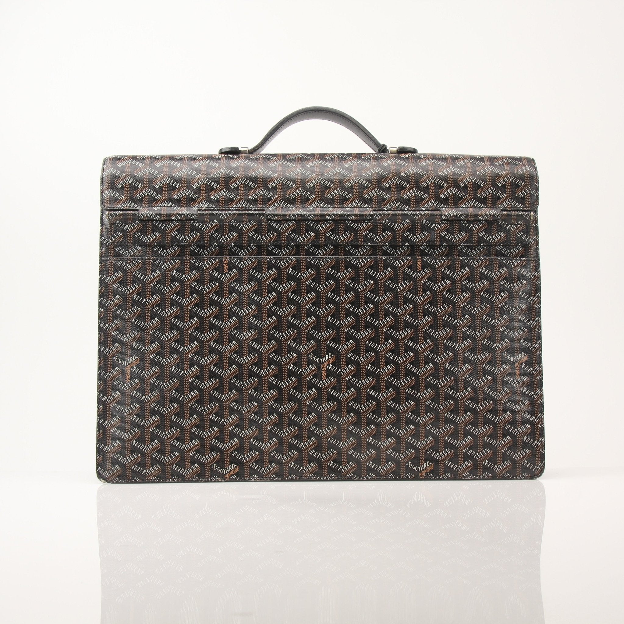 Goyard Serviette Chypre briefcase handbag with beige and green monogram pattern, gold hardware, and leather accents.