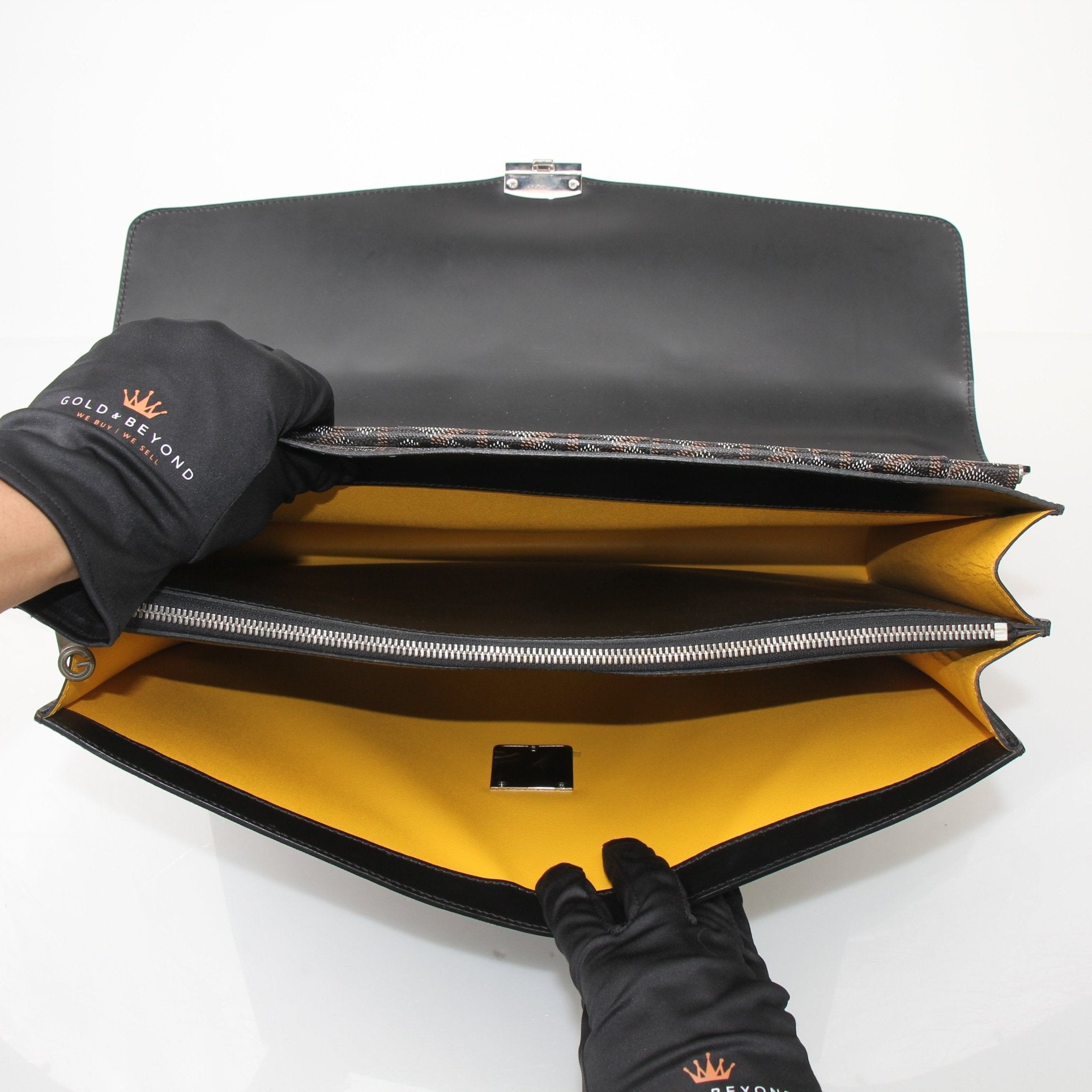 Gold & Beyond Goyard Serviette Chypre briefcase handbag with signature patterned exterior and leather handles.