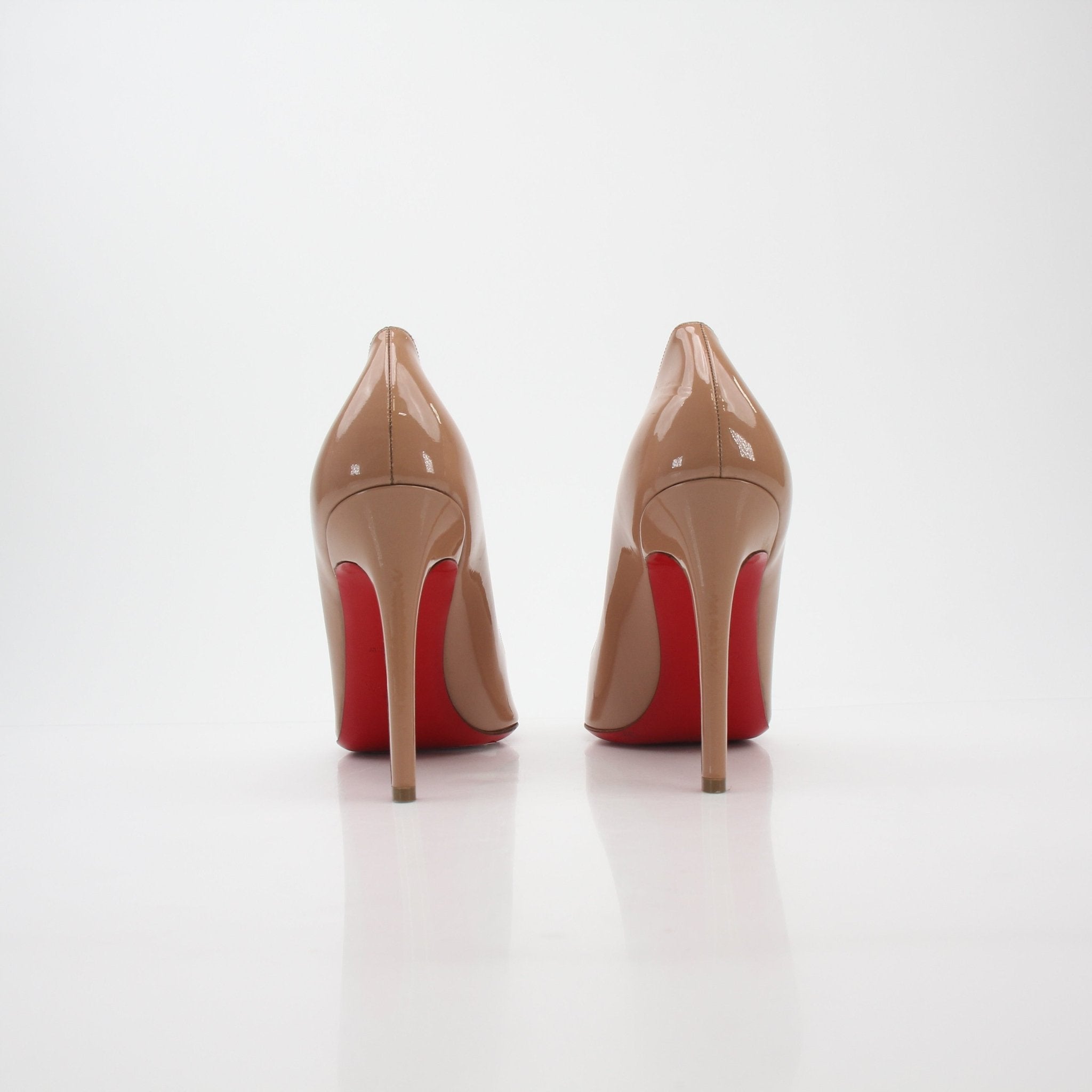 Christian Louboutin Nude Pigalle 100 Patent Leather Pumps