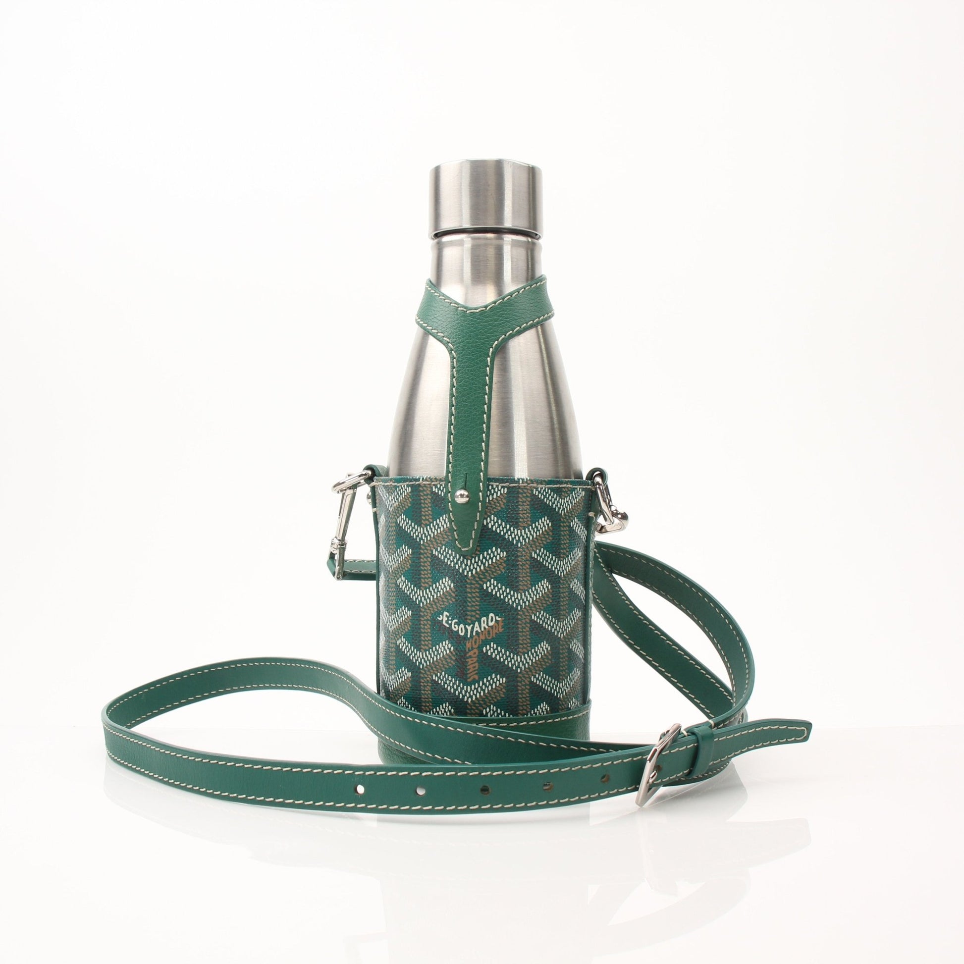 Gold & Beyond Goyard Yonne PM case and flask set, elegant accessories with Goyard branding and sleek design, displayed on a neutral background.