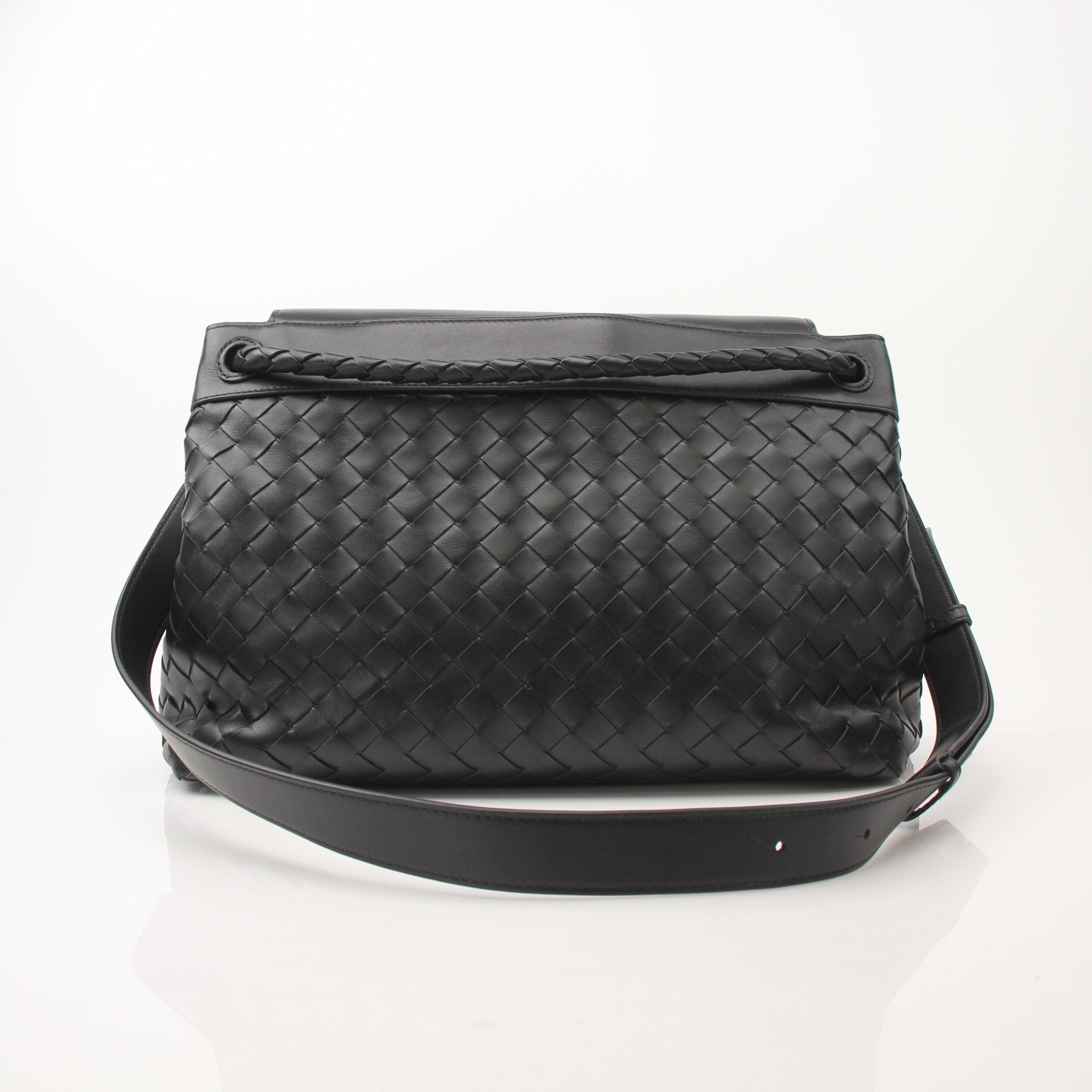 Gold and Beyond Bottega Veneta Andiamo Messenger handbag with smooth leather and adjustable strap, displayed on a neutral background.