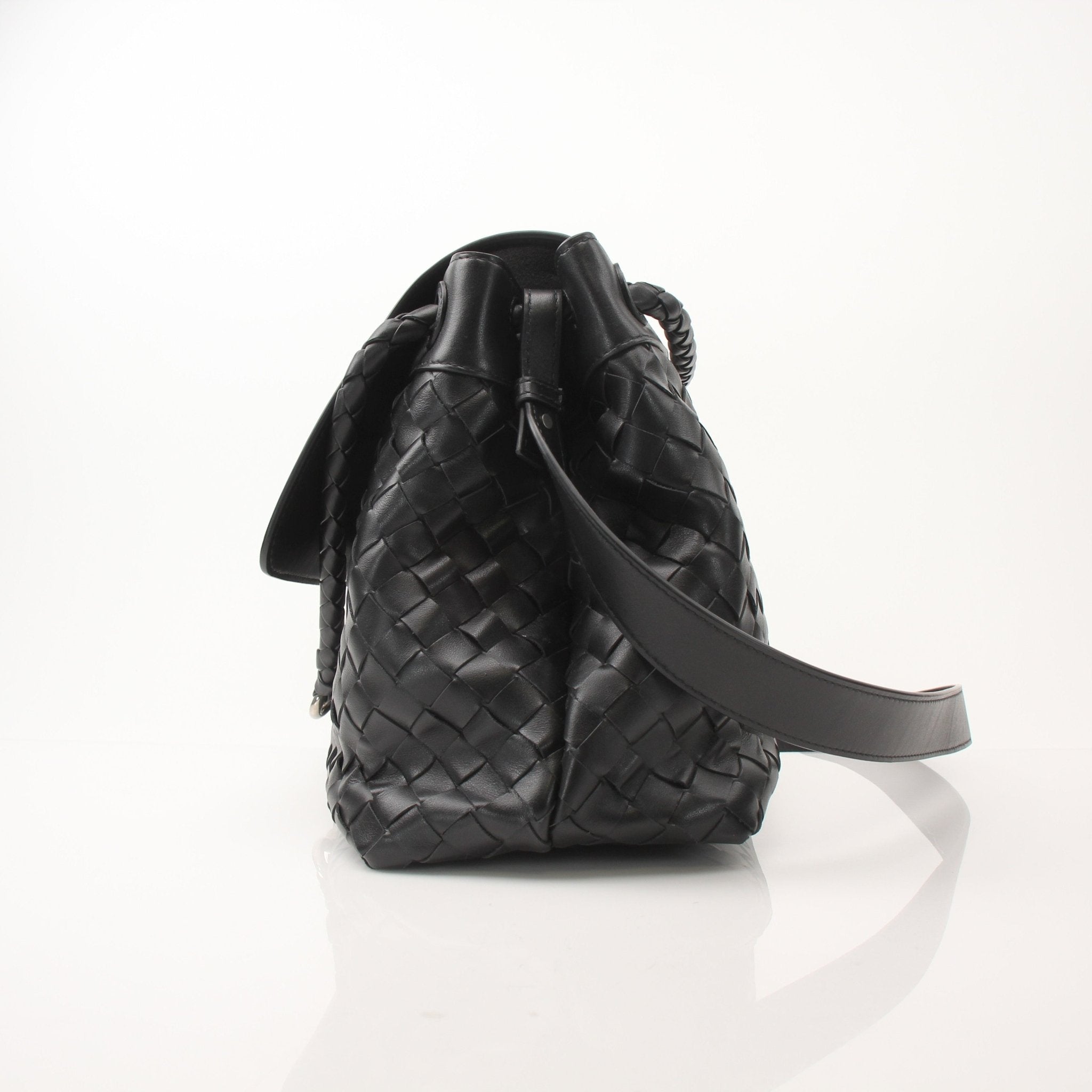 Gold & Beyond Bottega Veneta Andiamo Messenger handbag with leather strap and woven design, shown on a neutral background.