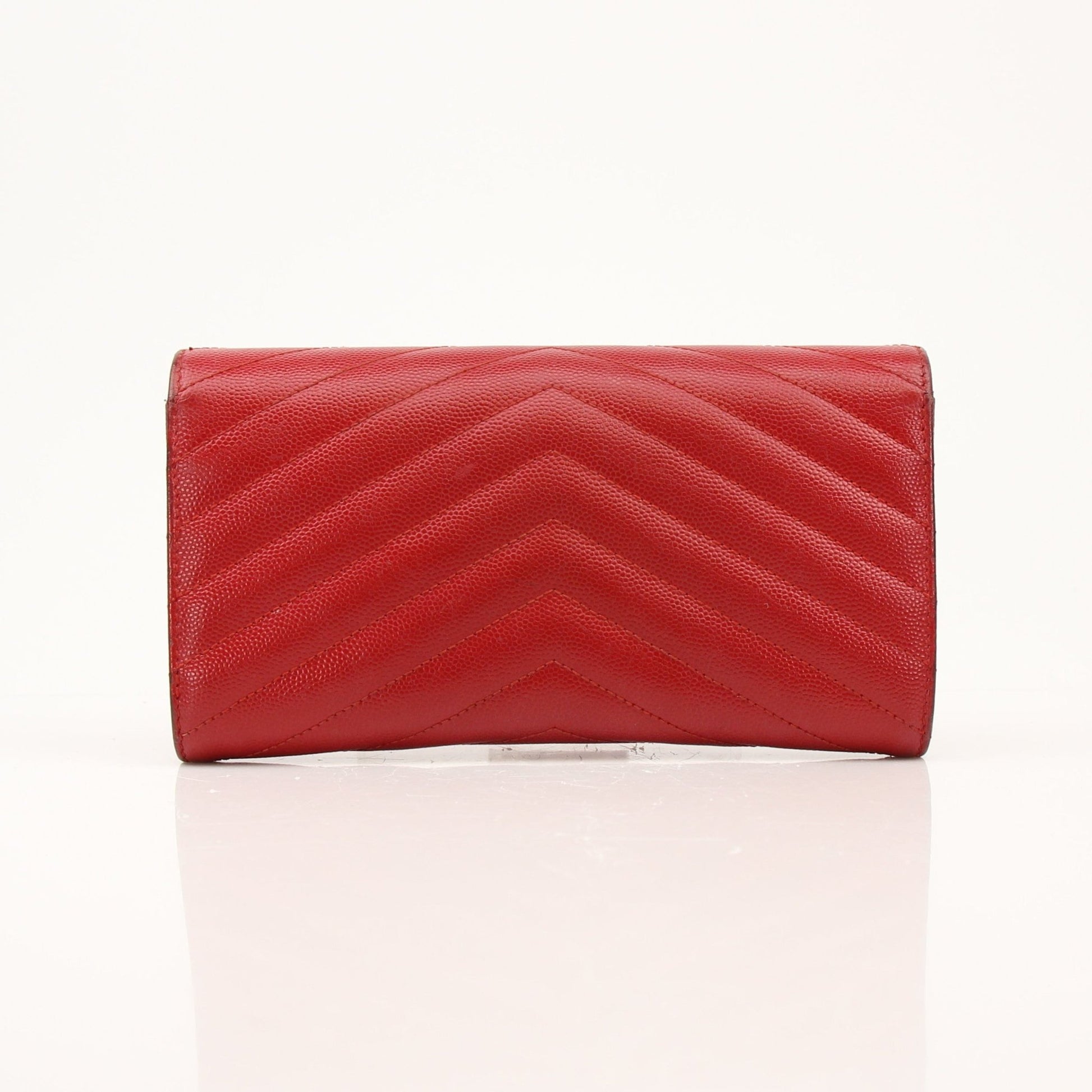 Red envelope chain wallet flap bag by Saint Laurent, stylish leather wallet with a gold chain strap, featuring a sleek flap closure.