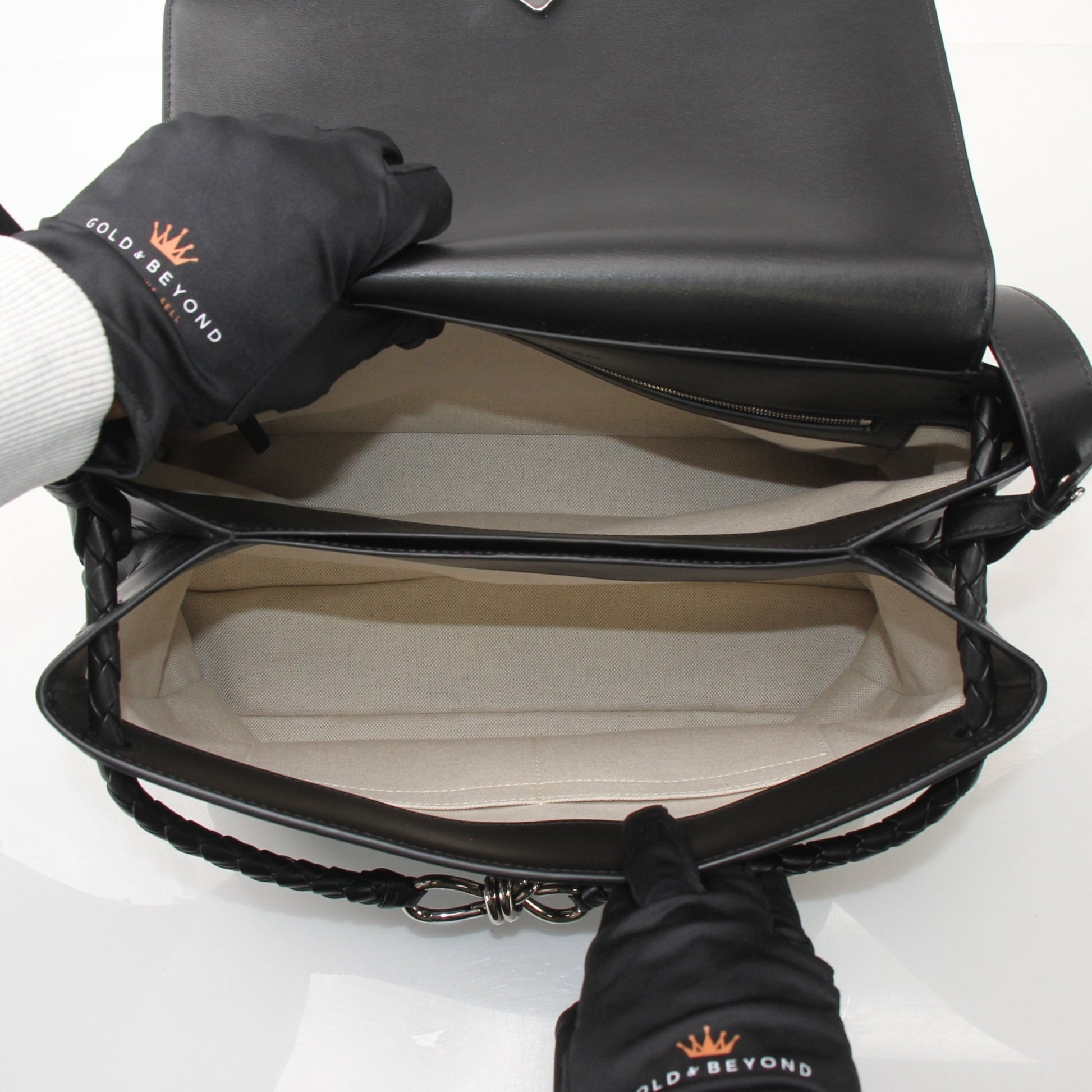 Bottega Veneta Andiamo Messenger handbag by Gold & Beyond, featuring smooth leather and adjustable shoulder strap.