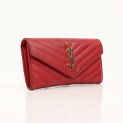 Gold & Beyond Saint Laurent red envelope chain wallet with flap design, featuring a sleek and compact style for everyday use.