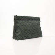 Gold & Beyond Bottega Veneta Mini Pouch handbag with textured leather and sleek design, shown in a close-up view.