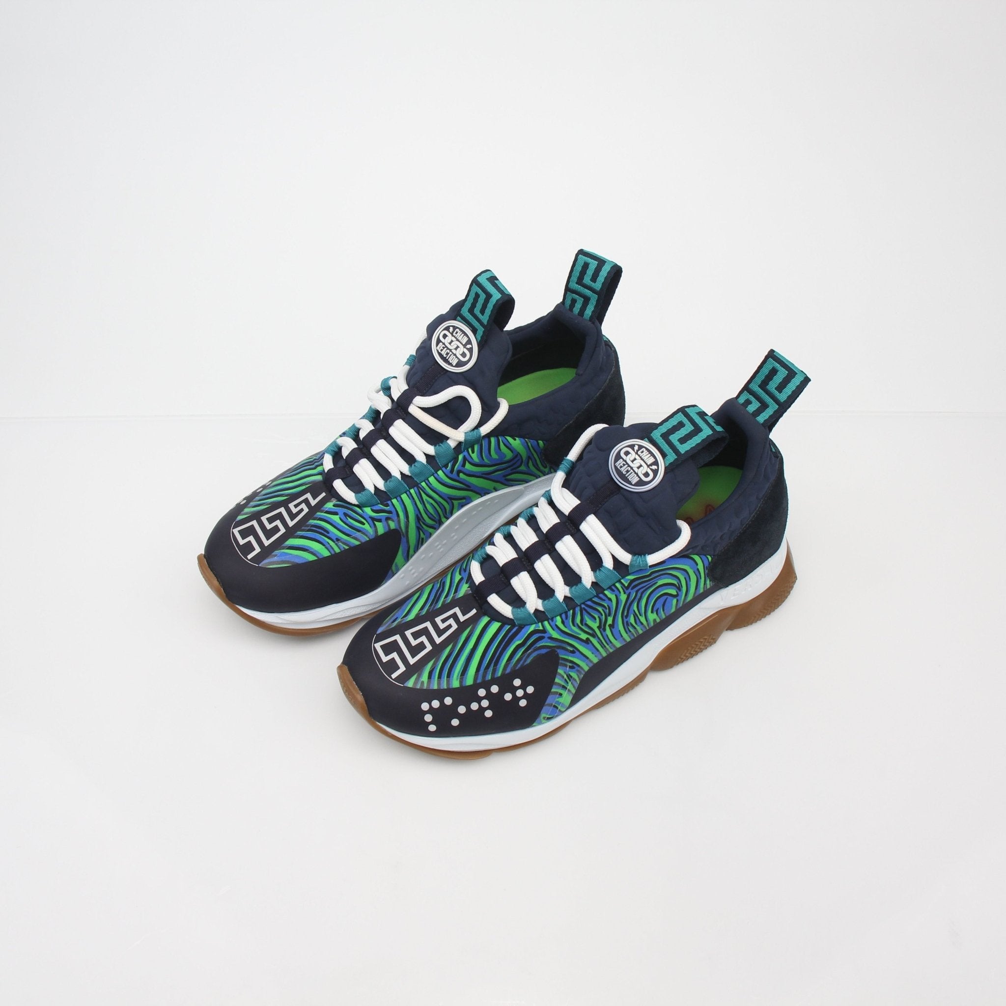 Versace Blue and Green Chain Reaction sneakers by Gold & Beyond featuring vibrant color-blocking and bold chain detail.