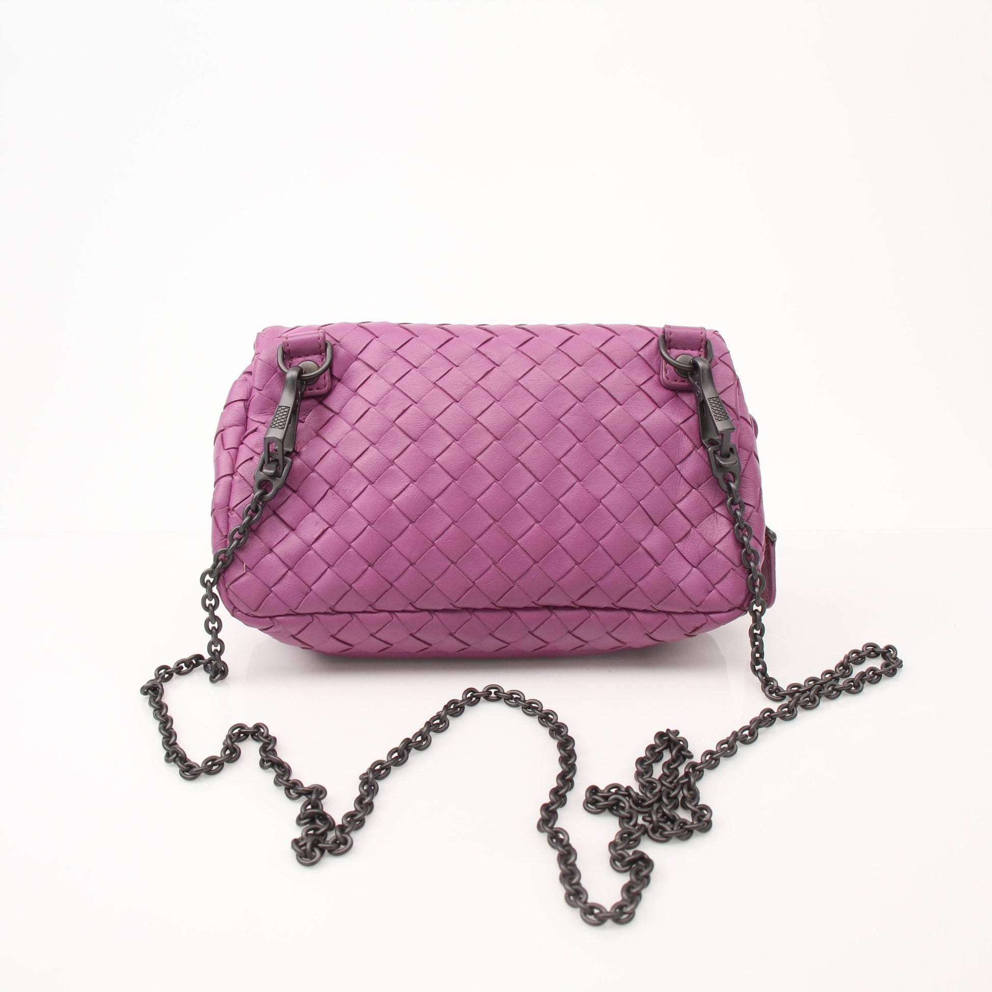 Bottega Veneta expandable chain flap handbag with gold-tone hardware and woven leather detail.