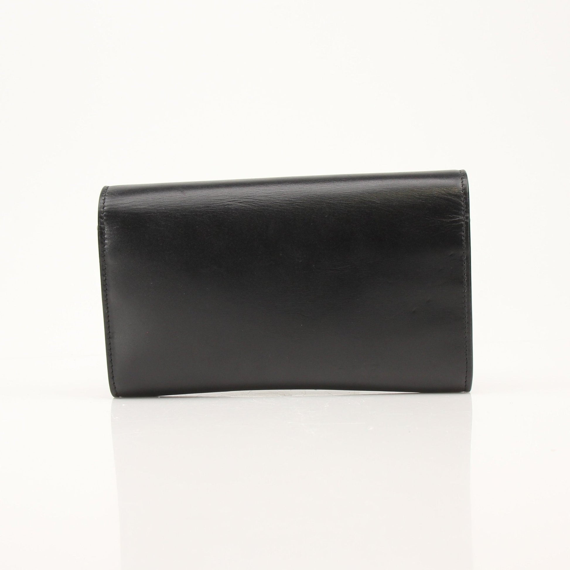Gold & Beyond Saint Laurent wallet on chain, sleek leather wallet with chain strap and gold-tone hardware, stylish and compact accessory.