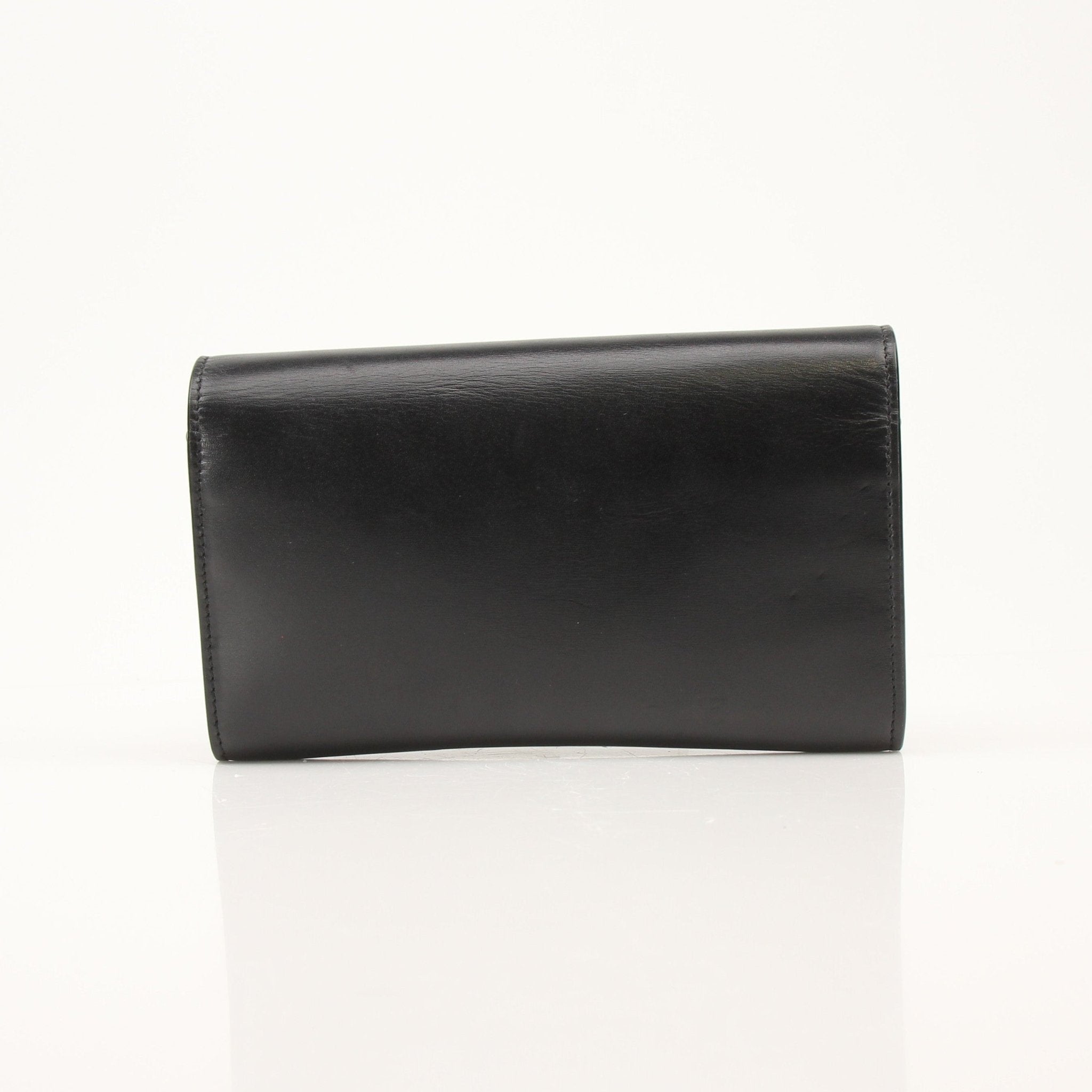 Gold & Beyond Saint Laurent wallet on chain, sleek leather wallet with chain strap and gold-tone hardware, stylish and compact accessory.