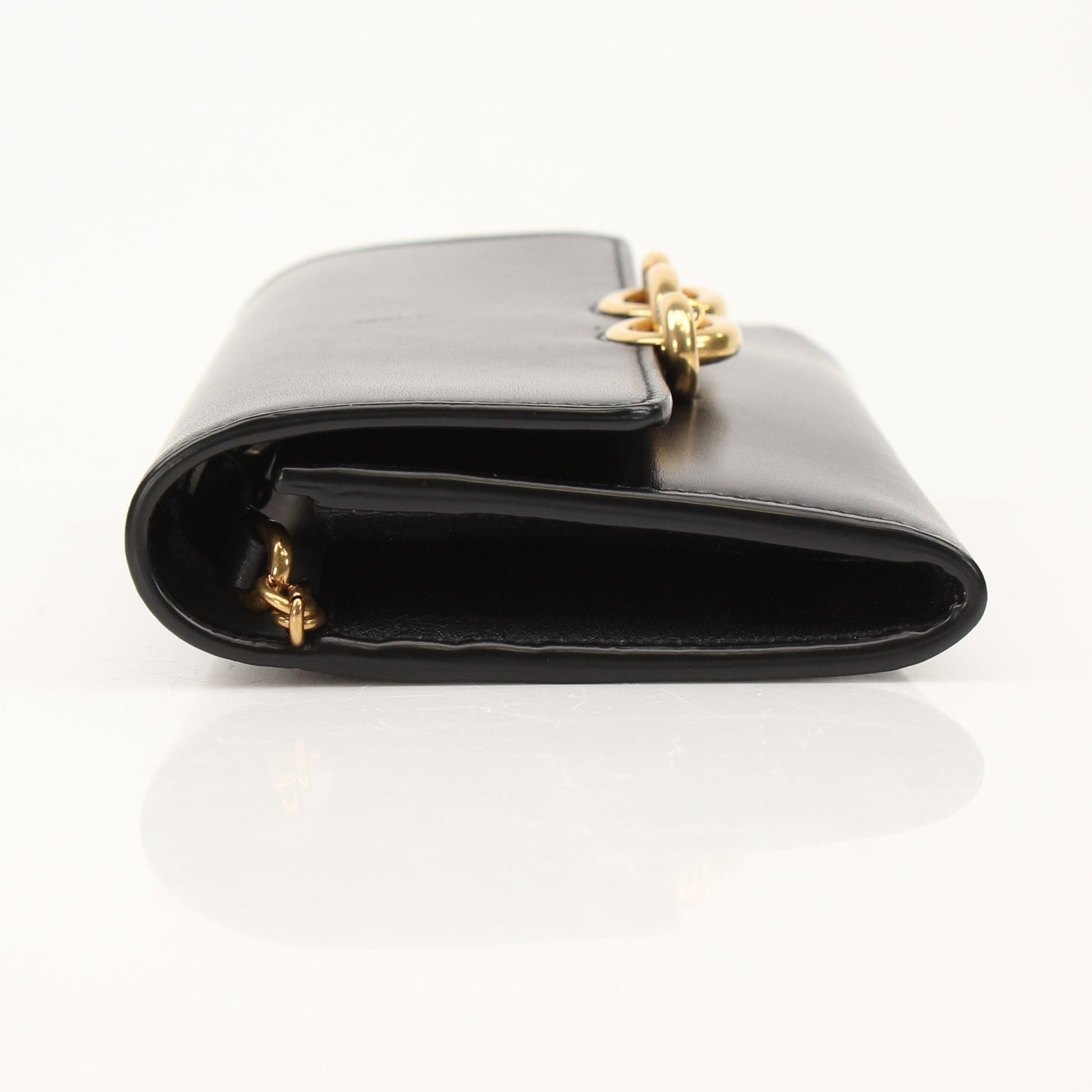 Gold & Beyond Saint Laurent Wallet on Chain with gold hardware and leather details, showing the front view of the stylish wallet.