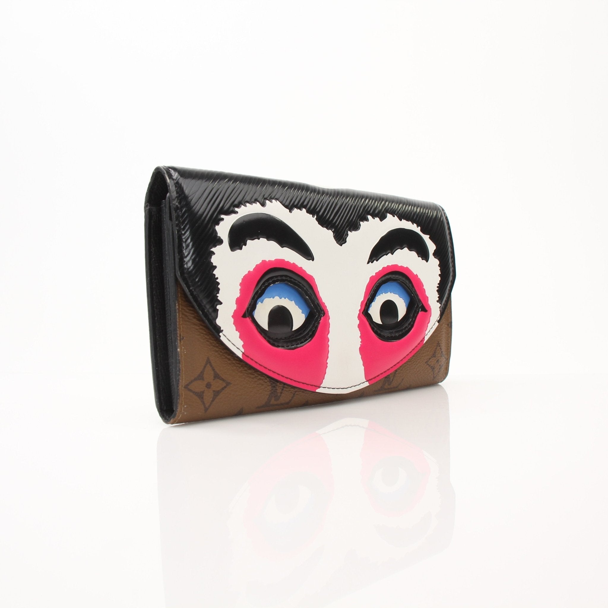 Louis Vuitton Sarah Kabuki wallet by Gold & Beyond, showcasing a sleek leather design with gold accents and multiple card slots.
