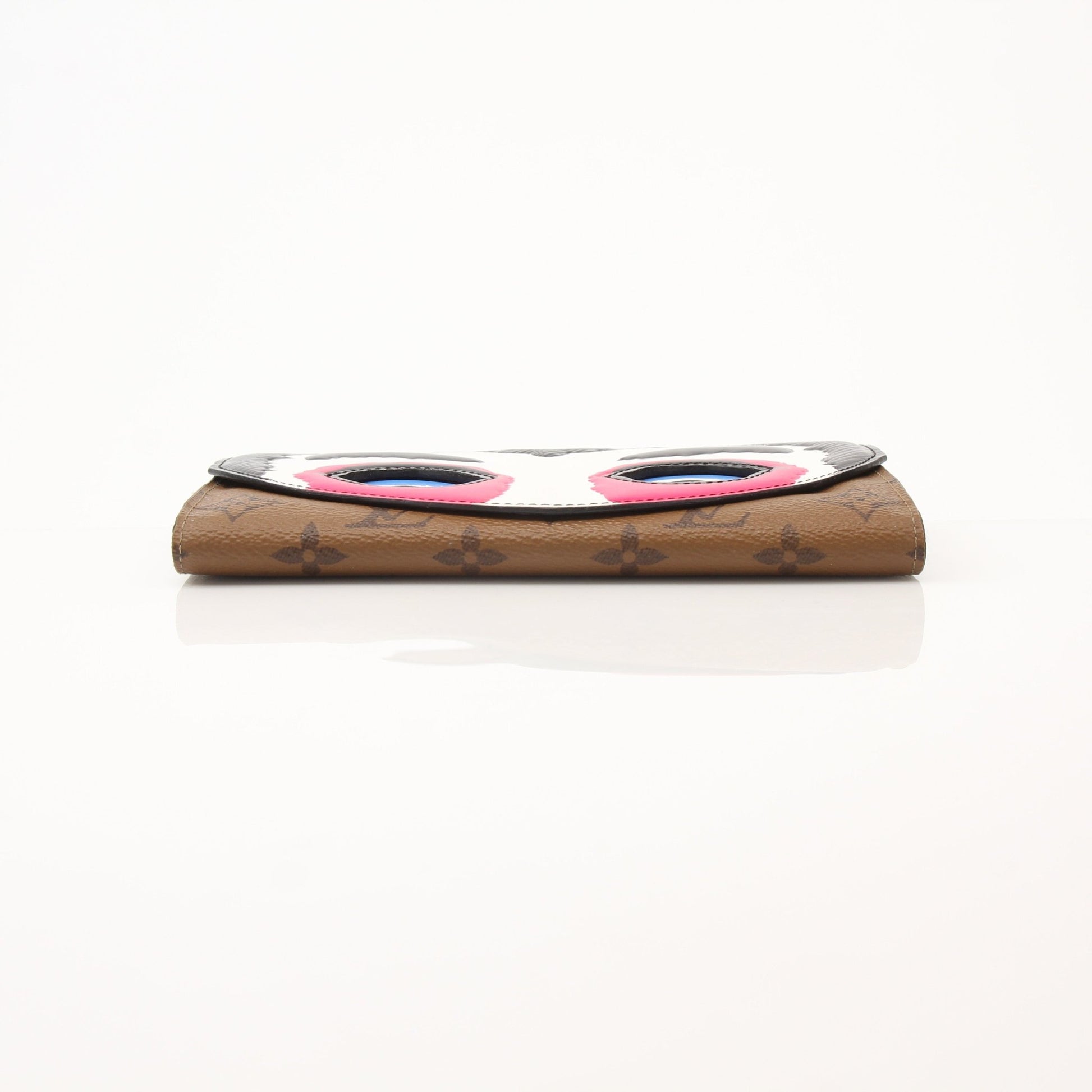 Louis Vuitton Sarah Kabuki Wallet by Gold & Beyond, featuring a sleek design with gold accents and signature monogram pattern.