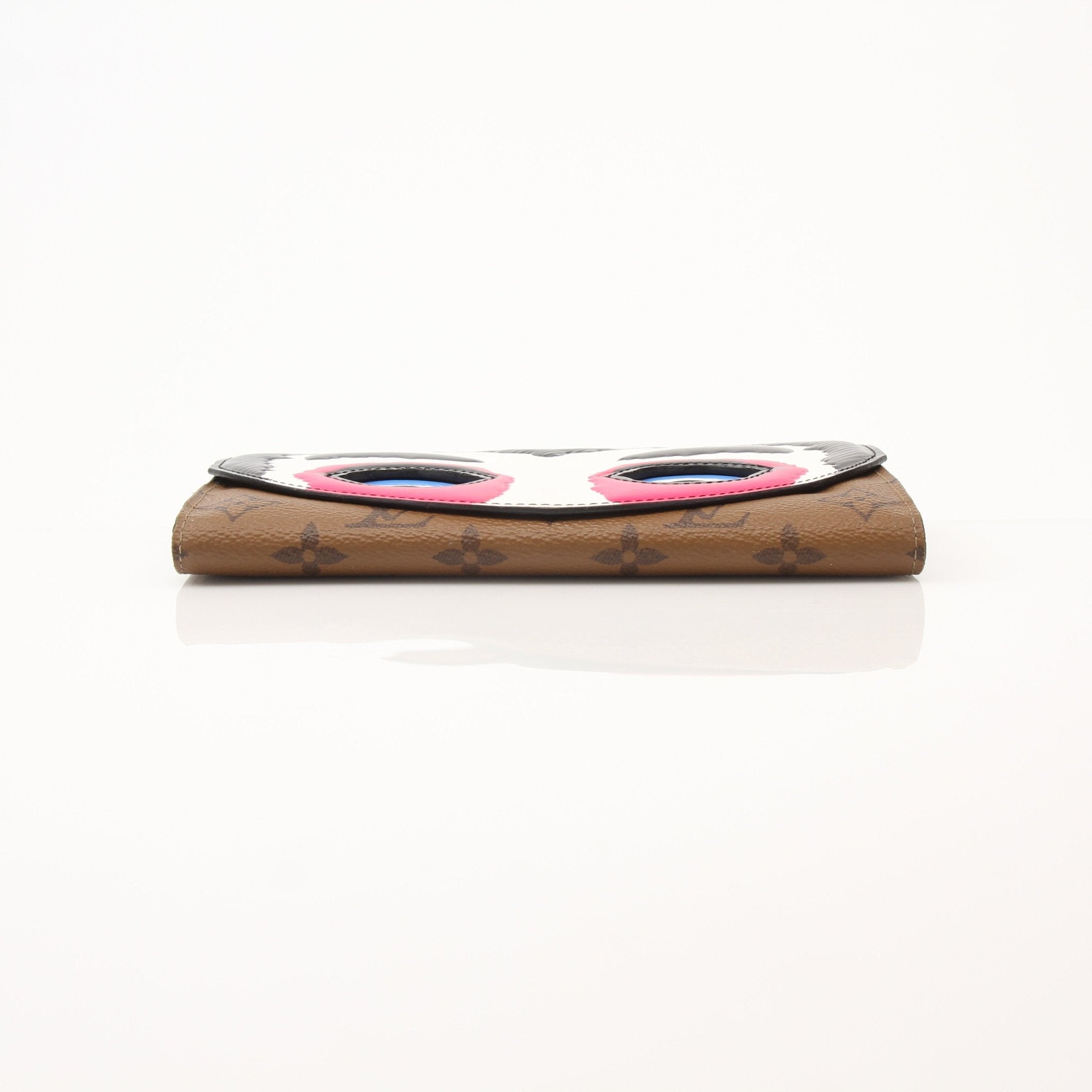 Louis Vuitton Sarah Kabuki Wallet by Gold & Beyond, featuring a sleek design with gold accents and signature monogram pattern.