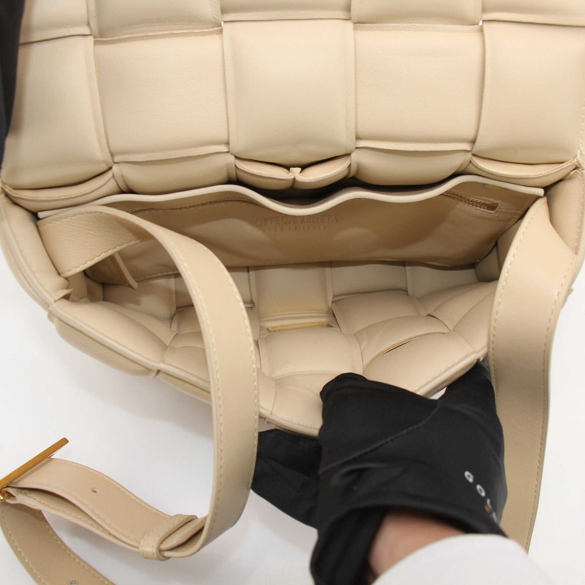 Gold & Beyond Bottega Veneta Padded Cassette Bag handbag with padded leather and signature woven design, front view.
