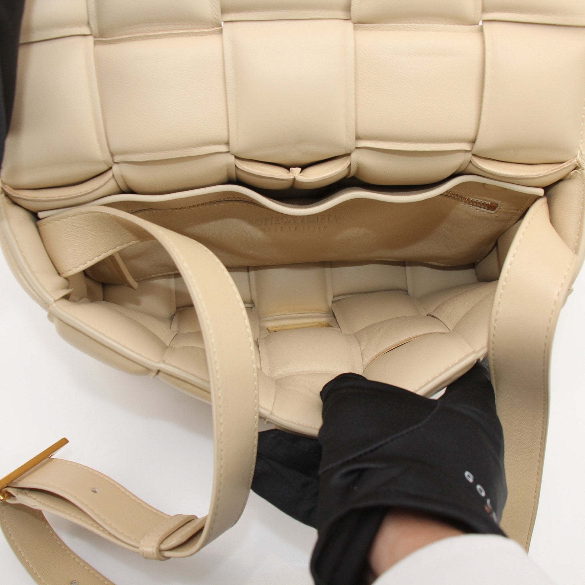Gold & Beyond Bottega Veneta Padded Cassette Bag handbag with padded leather and signature woven design, front view.
