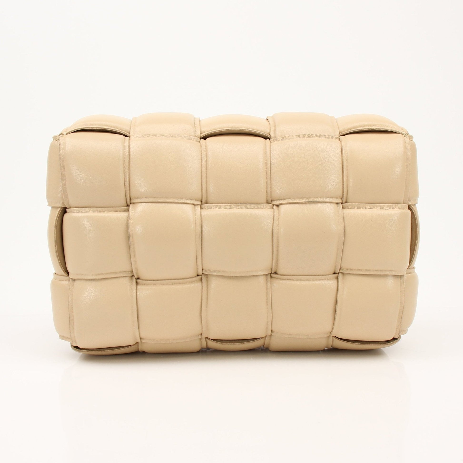 Gold & Beyond Bottega Veneta Padded Cassette Bag handbag with signature woven leather design and shoulder strap.