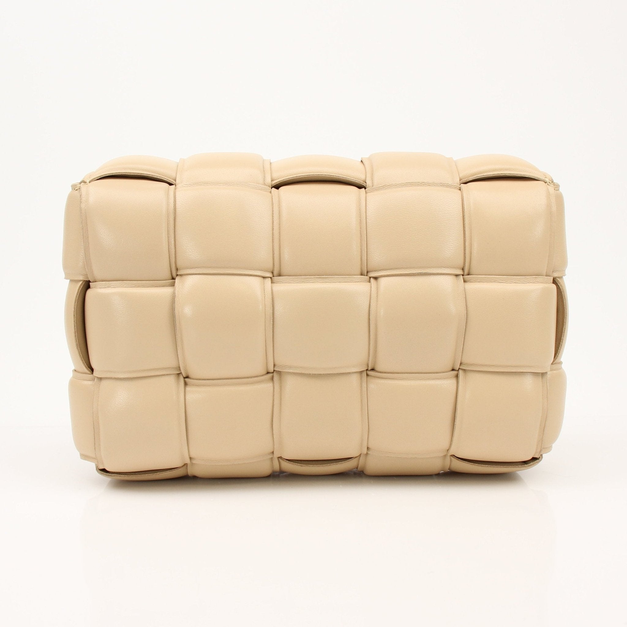 Gold & Beyond Bottega Veneta Padded Cassette Bag handbag with signature woven leather design and shoulder strap.