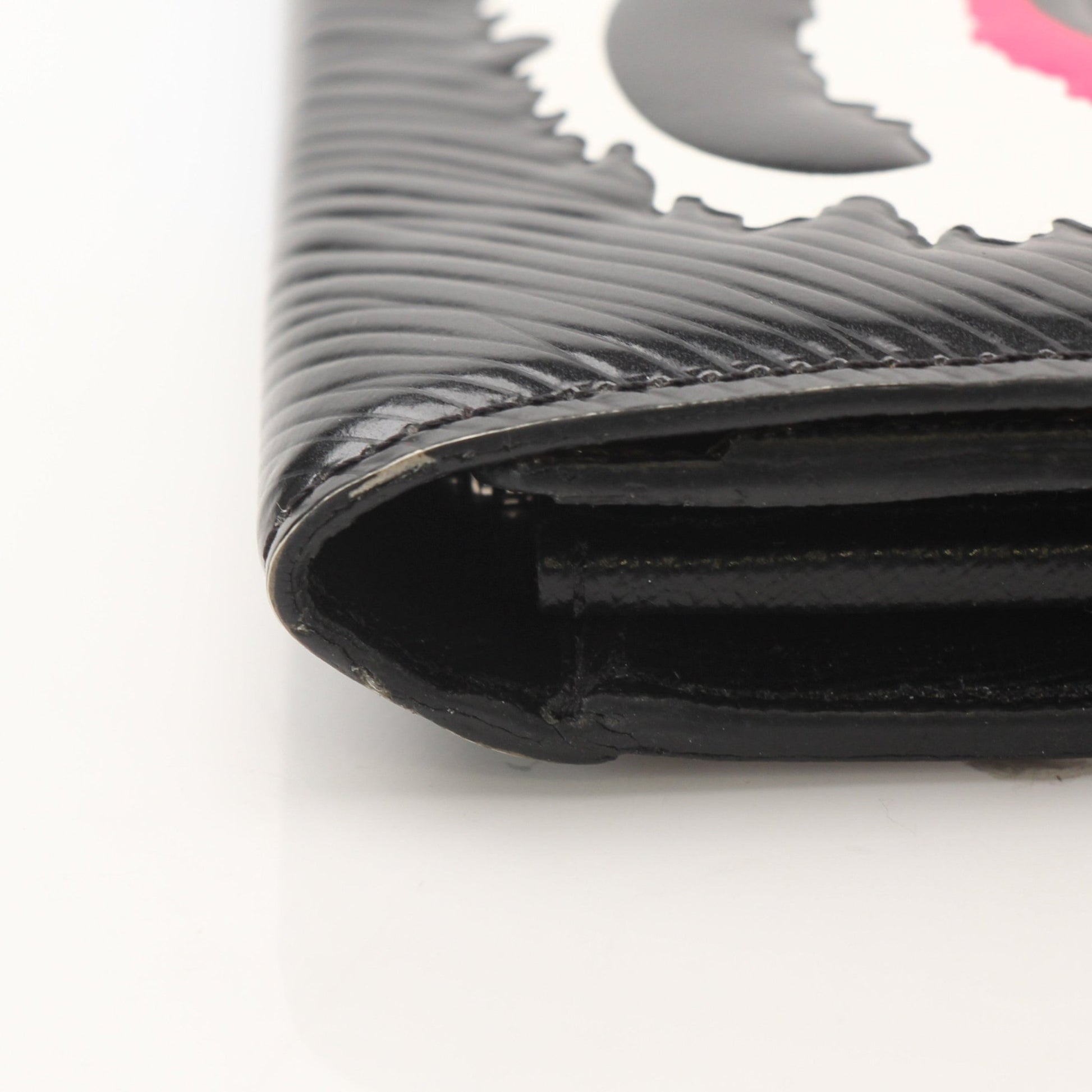 Louis Vuitton Sarah Kabuki wallet by Gold & Beyond, showcasing the elegant design and signature monogram pattern in the image.
