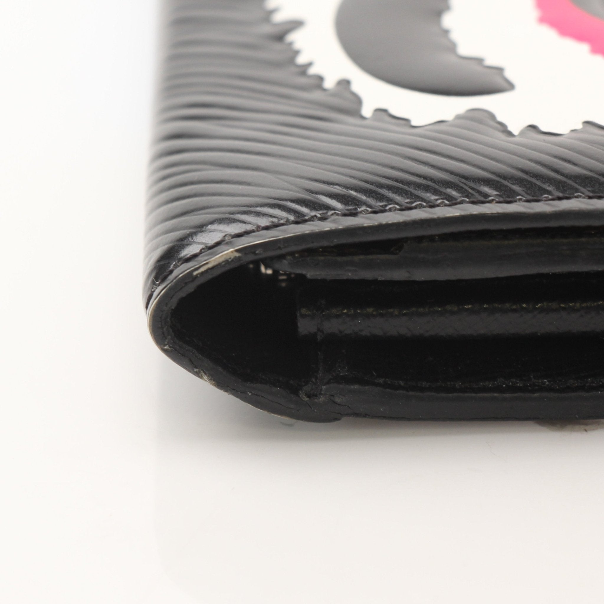Louis Vuitton Sarah Kabuki wallet by Gold & Beyond, showcasing the elegant design and signature monogram pattern in the image.