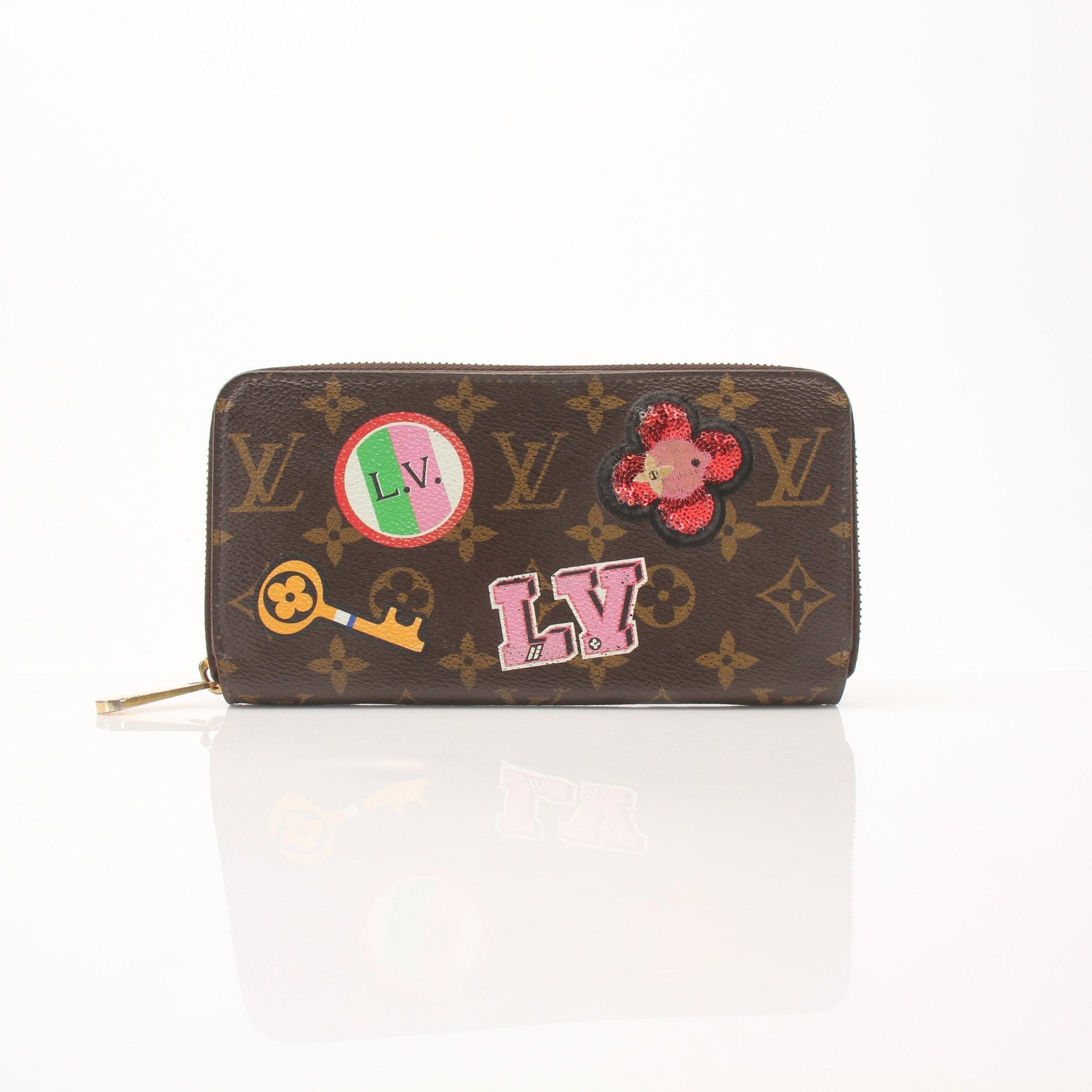 Louis Vuitton LV Stories Zippy Wallet by Gold & Beyond, featuring signature design and multiple card slots, shown open with interior details.