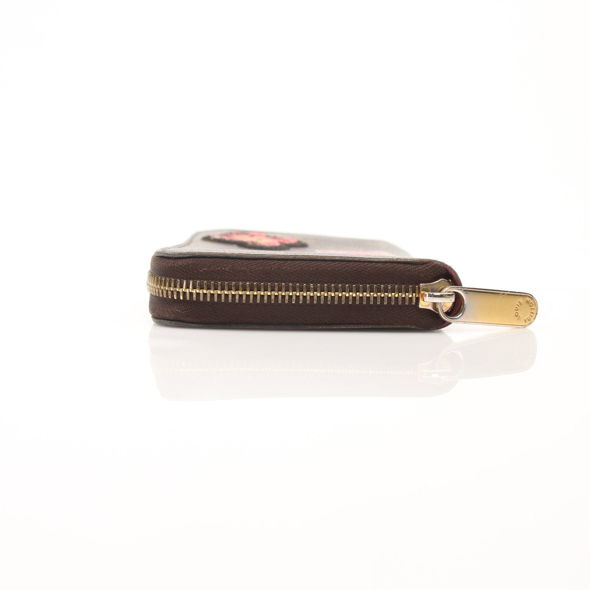 Louis Vuitton LV Stories Zippy Wallet by Gold & Beyond, featuring leather and signature monogram design with multiple card slots.