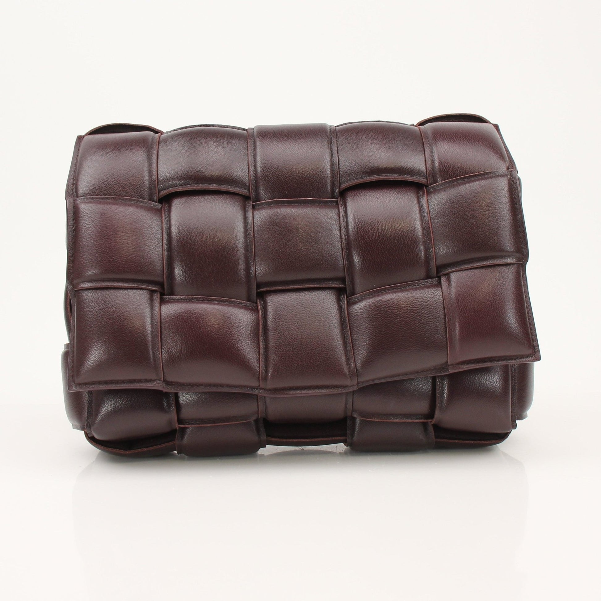 Gold & Beyond Bottega Veneta Padded Cassette Bag handbag with quilted leather design and gold-tone hardware.
