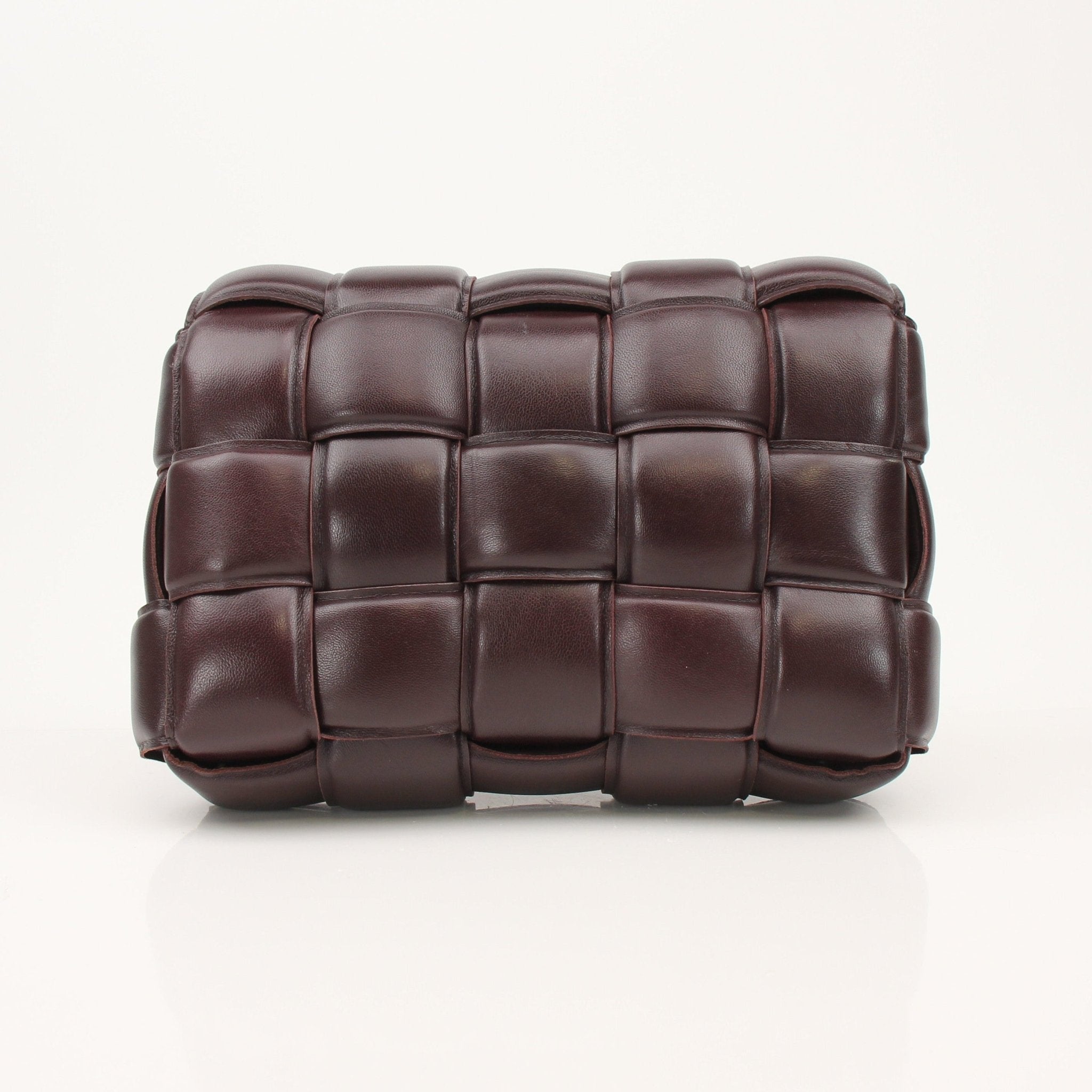Gold & Beyond Bottega Veneta Padded Cassette Bag handbag with signature intrecciato design and padded leather texture.