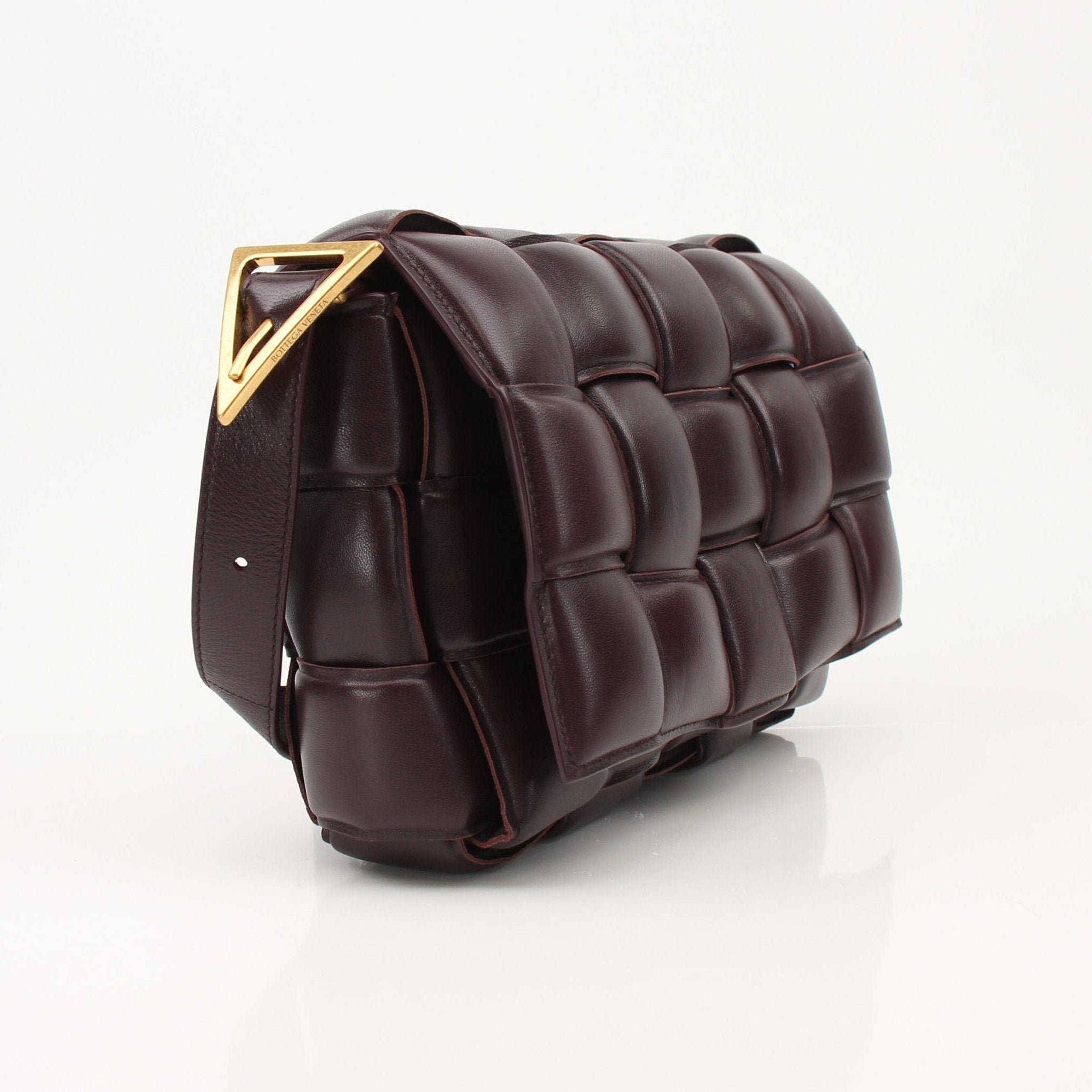 Gold & Beyond Bottega Veneta Padded Cassette Bag handbag with quilted design and chain strap, stylish and luxurious accessory.