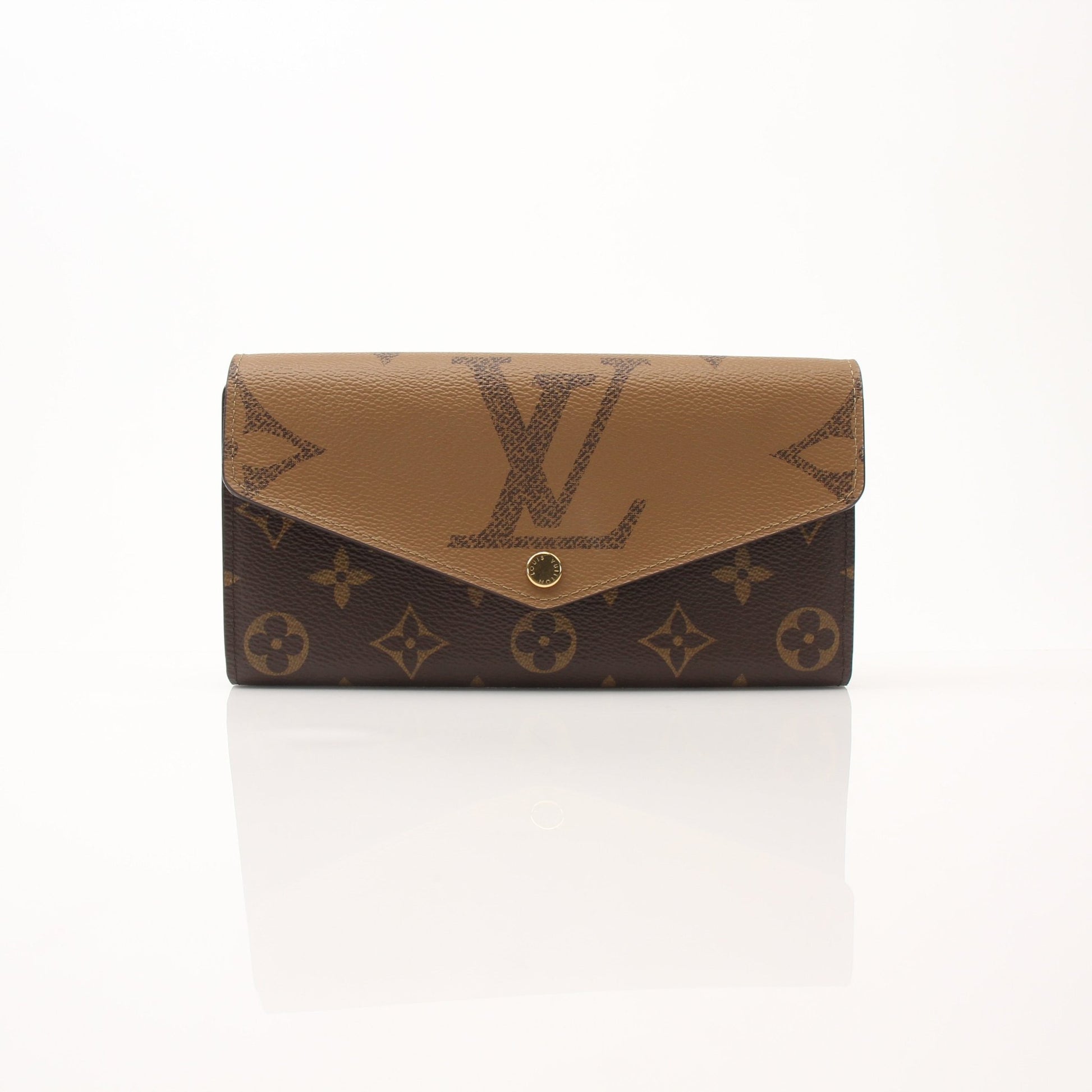 Louis Vuitton Reverse Monogram Wallet by Gold & Beyond, showing the dual-sided monogram design and leather interior.