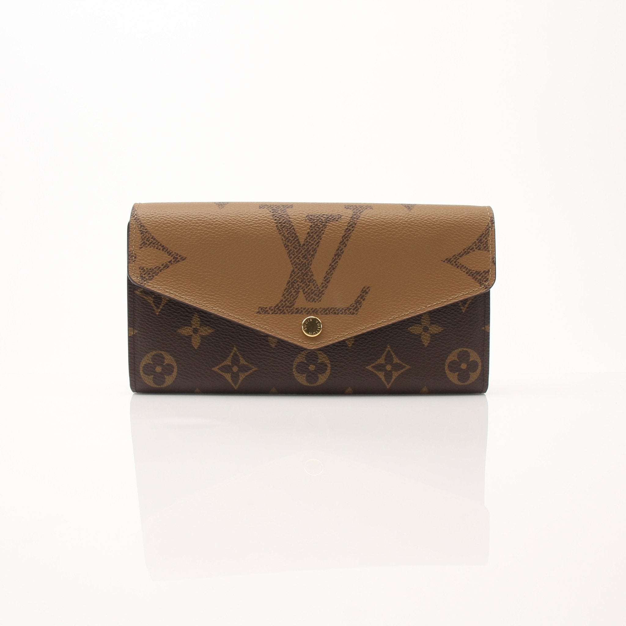 Louis Vuitton Reverse Monogram Wallet by Gold & Beyond, showing the dual-sided monogram design and leather interior.
