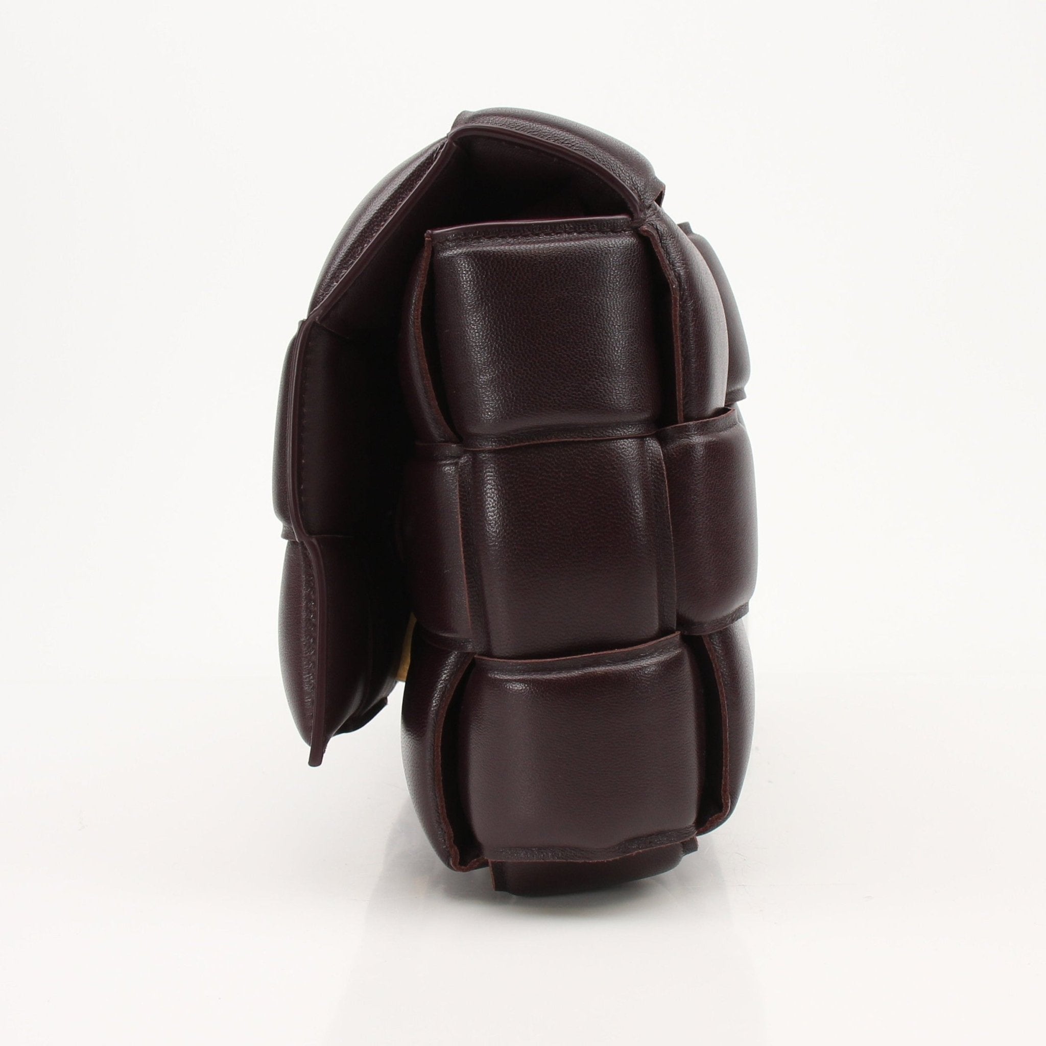 Gold & Beyond Bottega Veneta Padded Cassette Bag handbag with padded leather design and gold hardware detail.