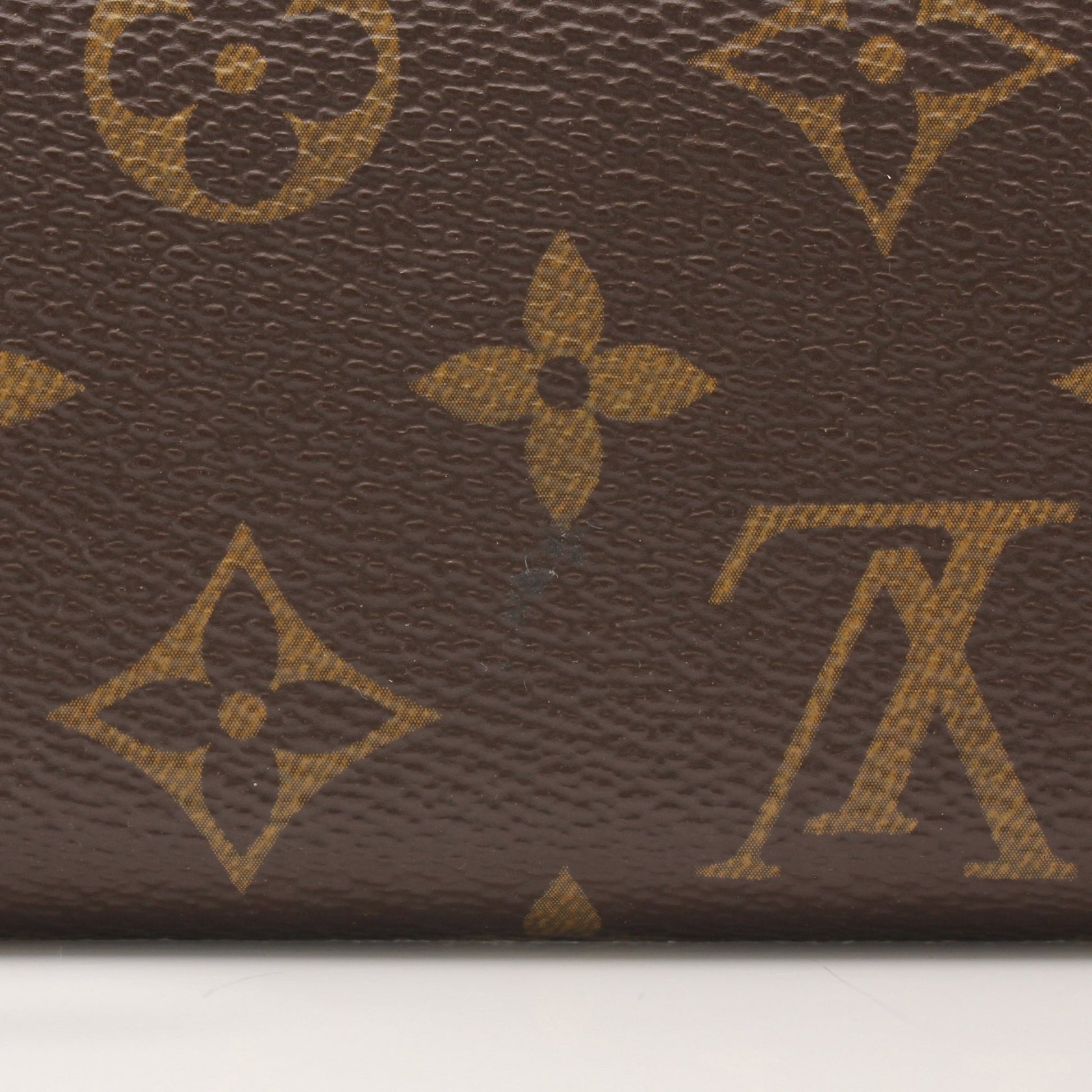 Louis Vuitton Reverse Monogram Wallet by Gold & Beyond, featuring signature monogram pattern and leather accents.