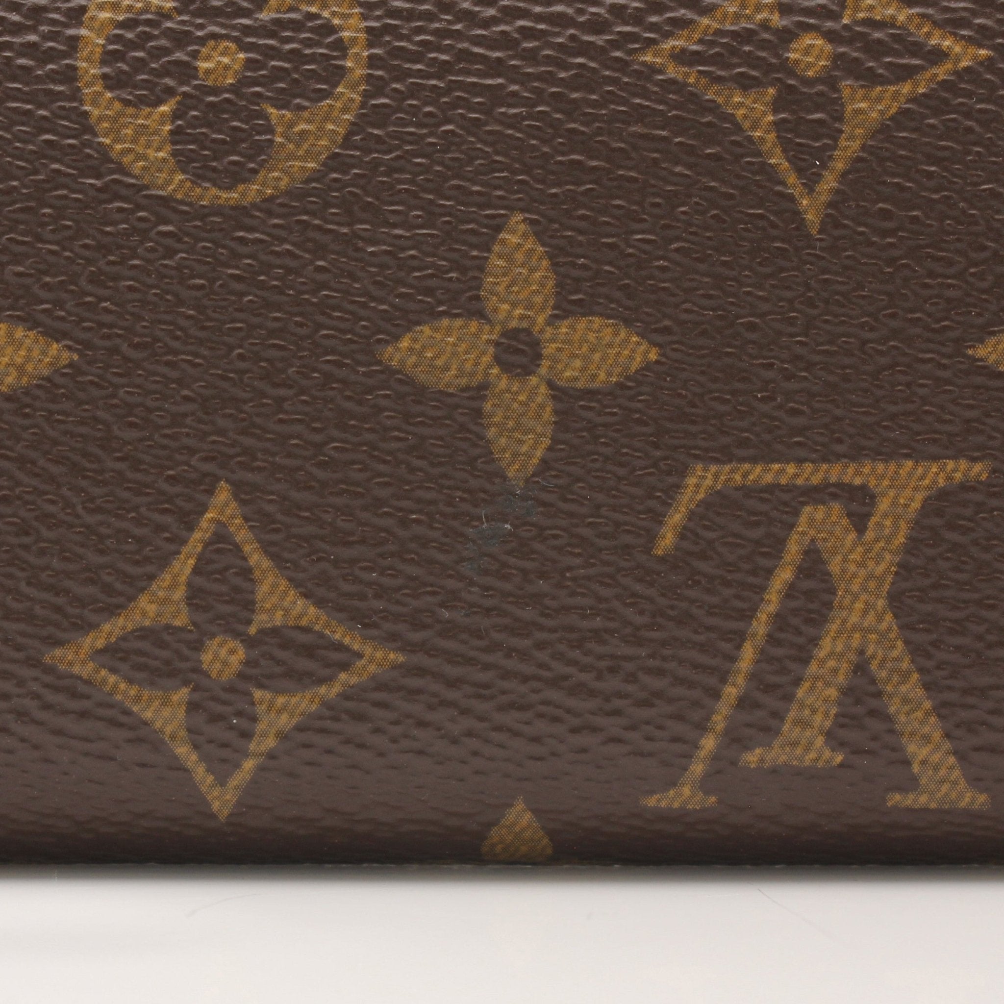 Louis Vuitton Reverse Monogram Wallet by Gold & Beyond, featuring signature monogram pattern and leather accents.