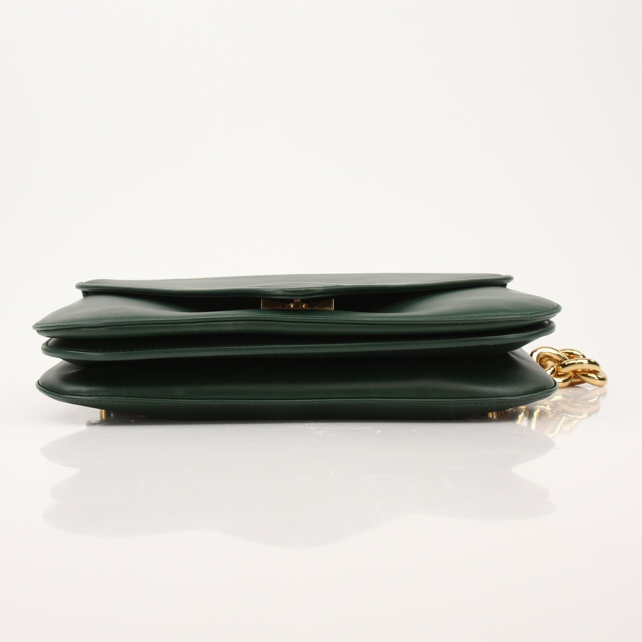 Gold & Beyond Bottega Veneta Mountain Envelope Bag, stylish leather handbag with a sleek envelope design and top handle.