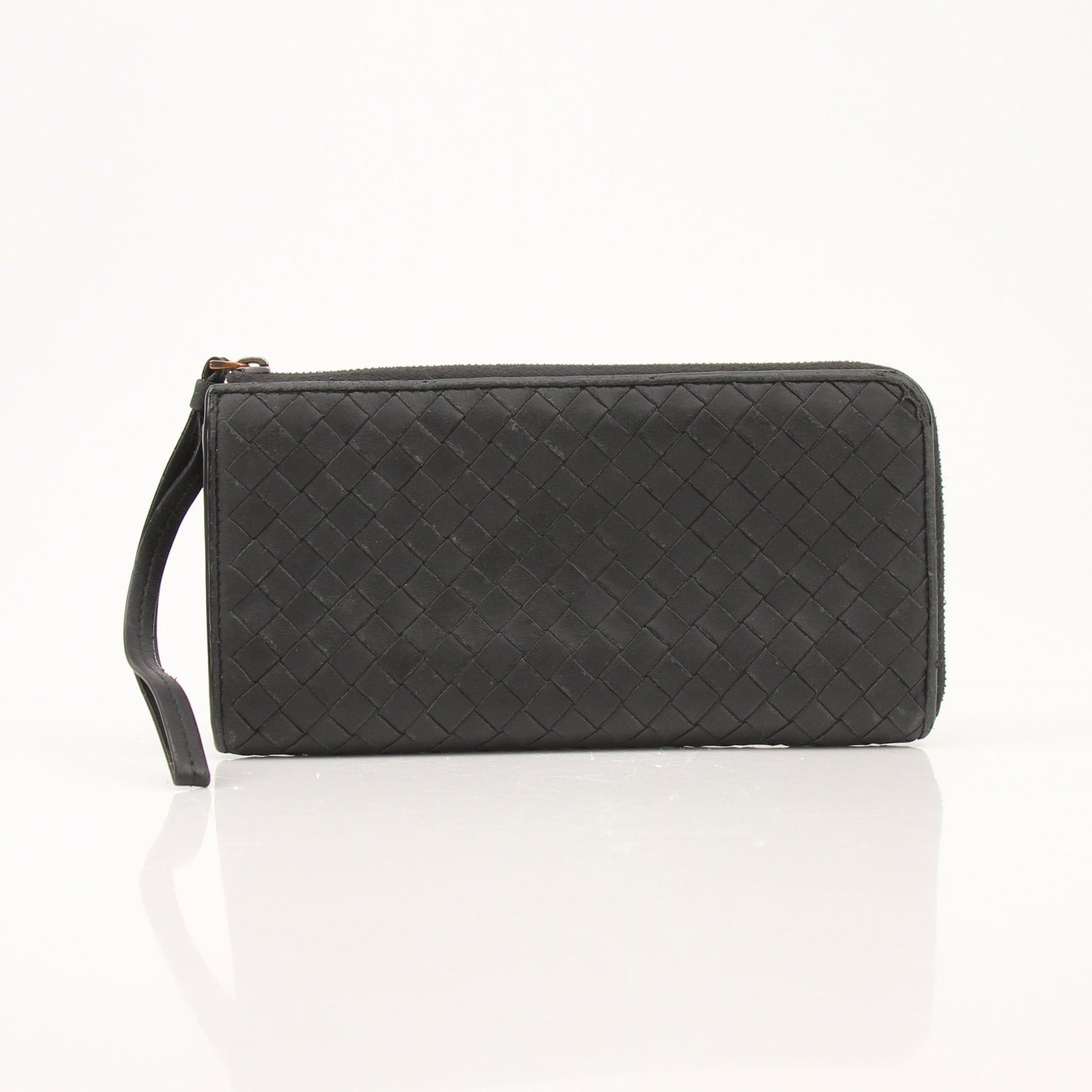 Black Bottega Veneta Nero Intrecciato leather wallet with woven design, showcasing elegant craftsmanship and compact size.